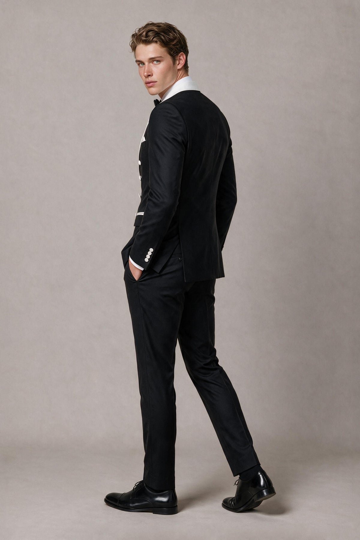 BOLODOO Men's Black Double-Breasted Tuxedo Blazer FQ0034 - side three-quarter back view showing slim tailored silhouette and sleeve detail