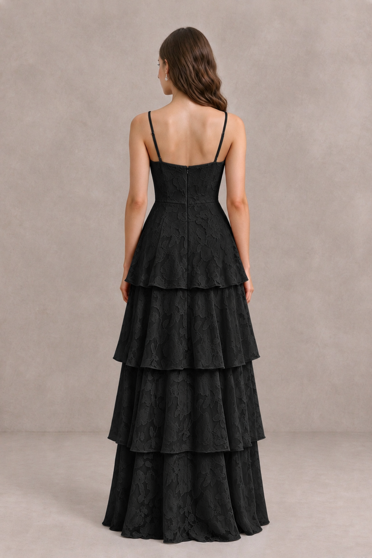 Back view of BOLODOO XX097 black tiered gown with spaghetti straps, low back and center-back zipper