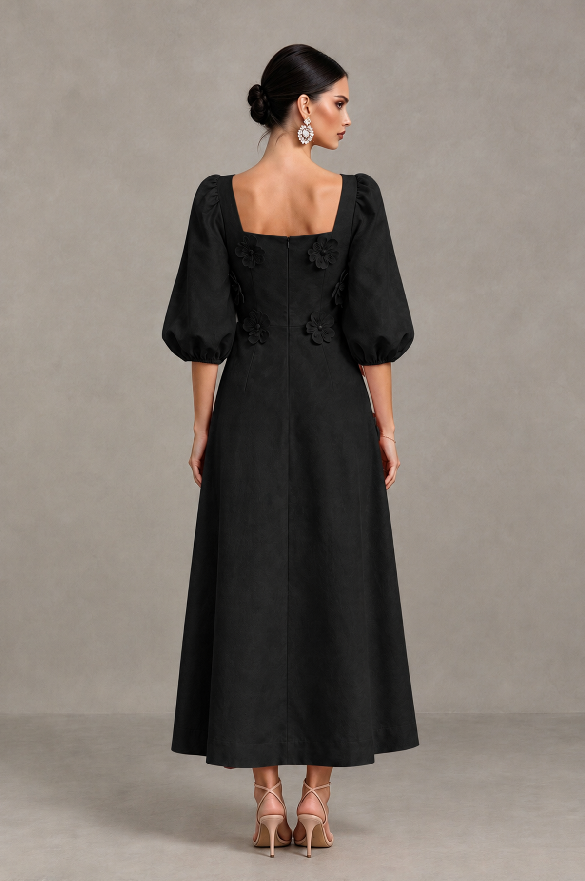 Black floral midi cocktail dress back view with square back neckline and puff sleeves