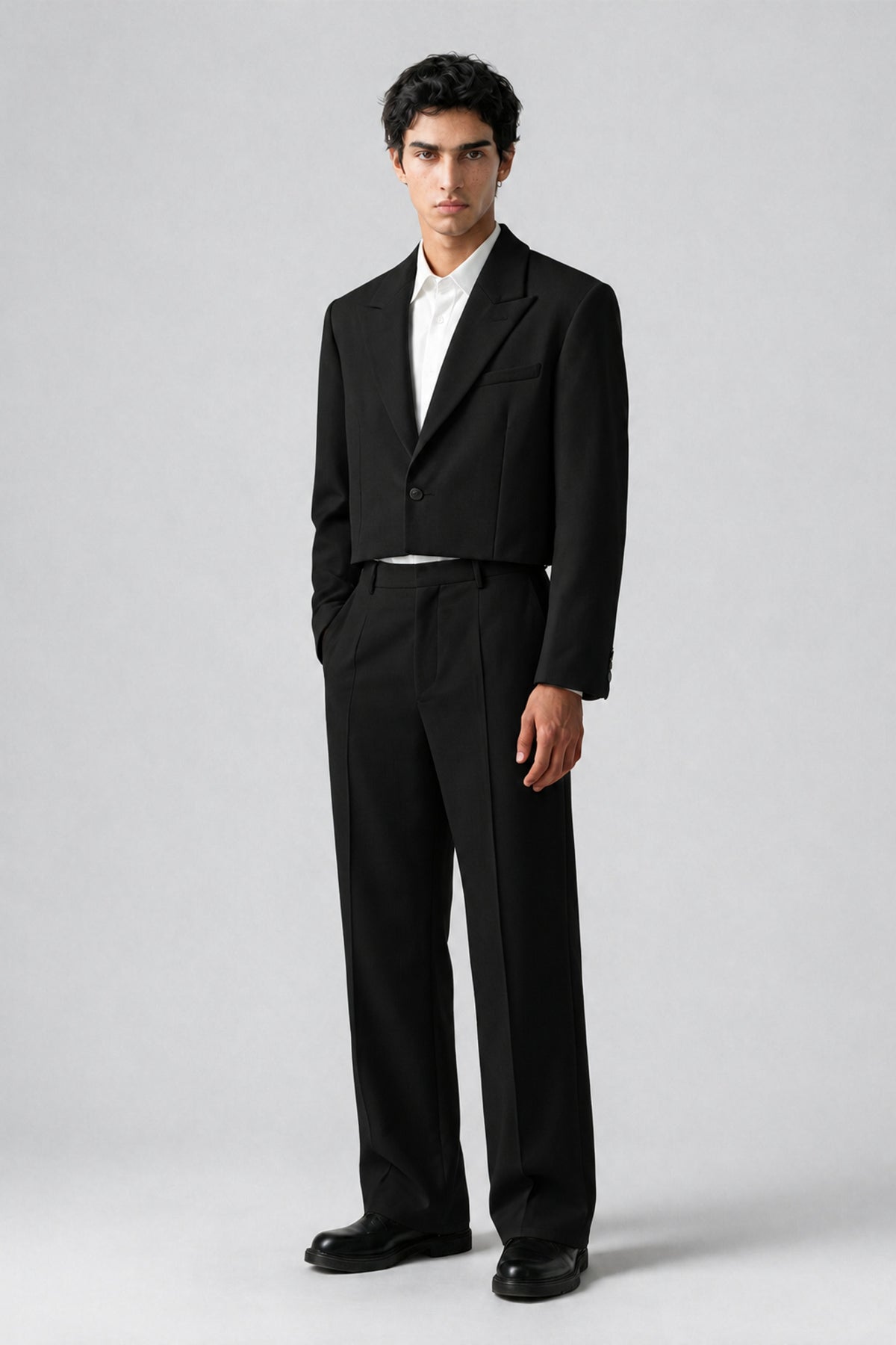 Bolodoo black cropped blazer and full-length wide-leg trousers, back view