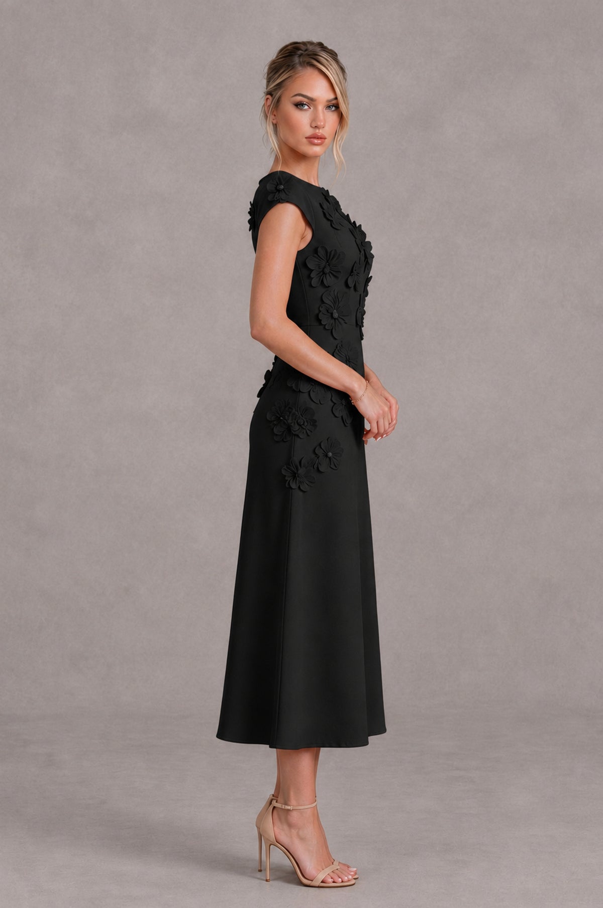 BOLODOO black cap sleeve midi cocktail dress side view with dimensional flower details