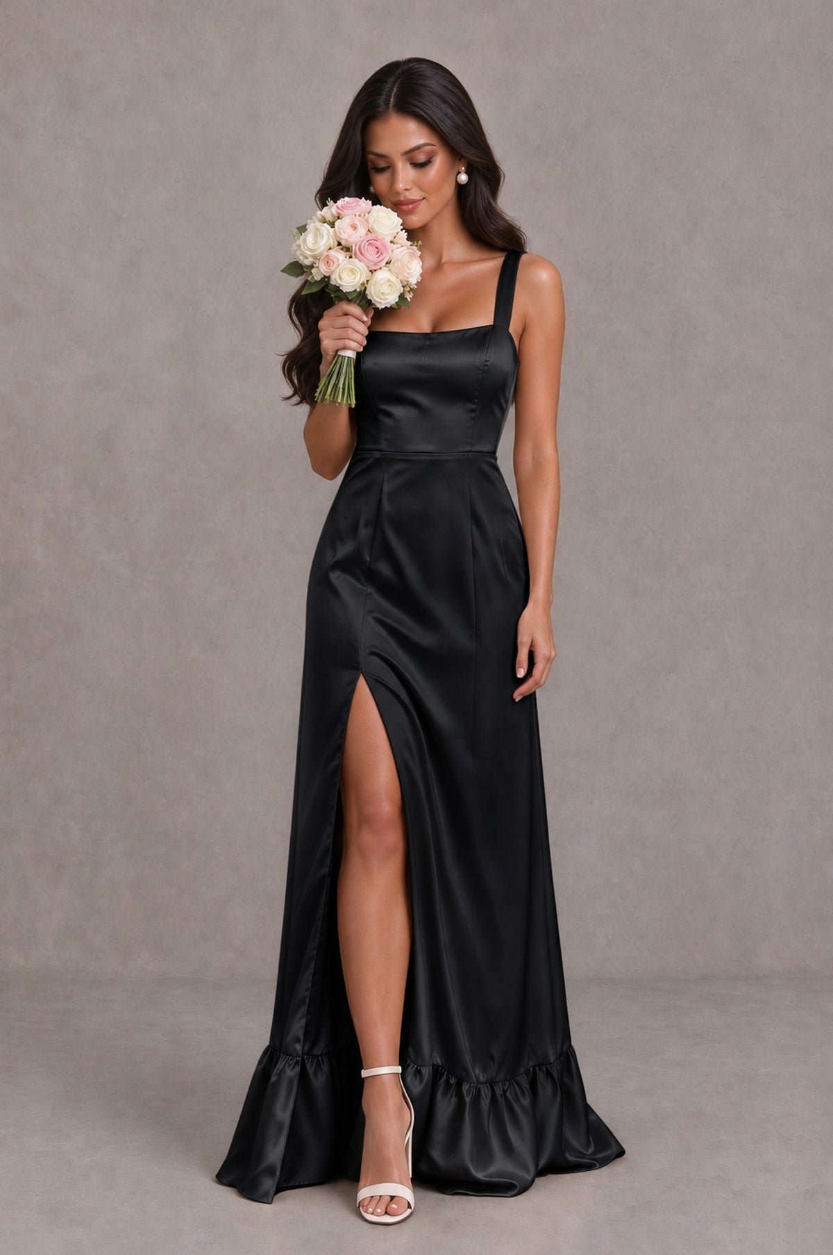 Black satin bridesmaid dress with square neckline and ruffle hem, holding bouquet