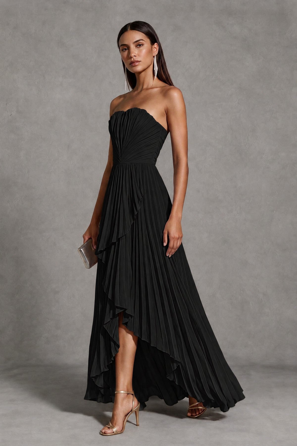 BOLODOO black strapless pleated high-low evening gown with cascading ruffle hem, front view