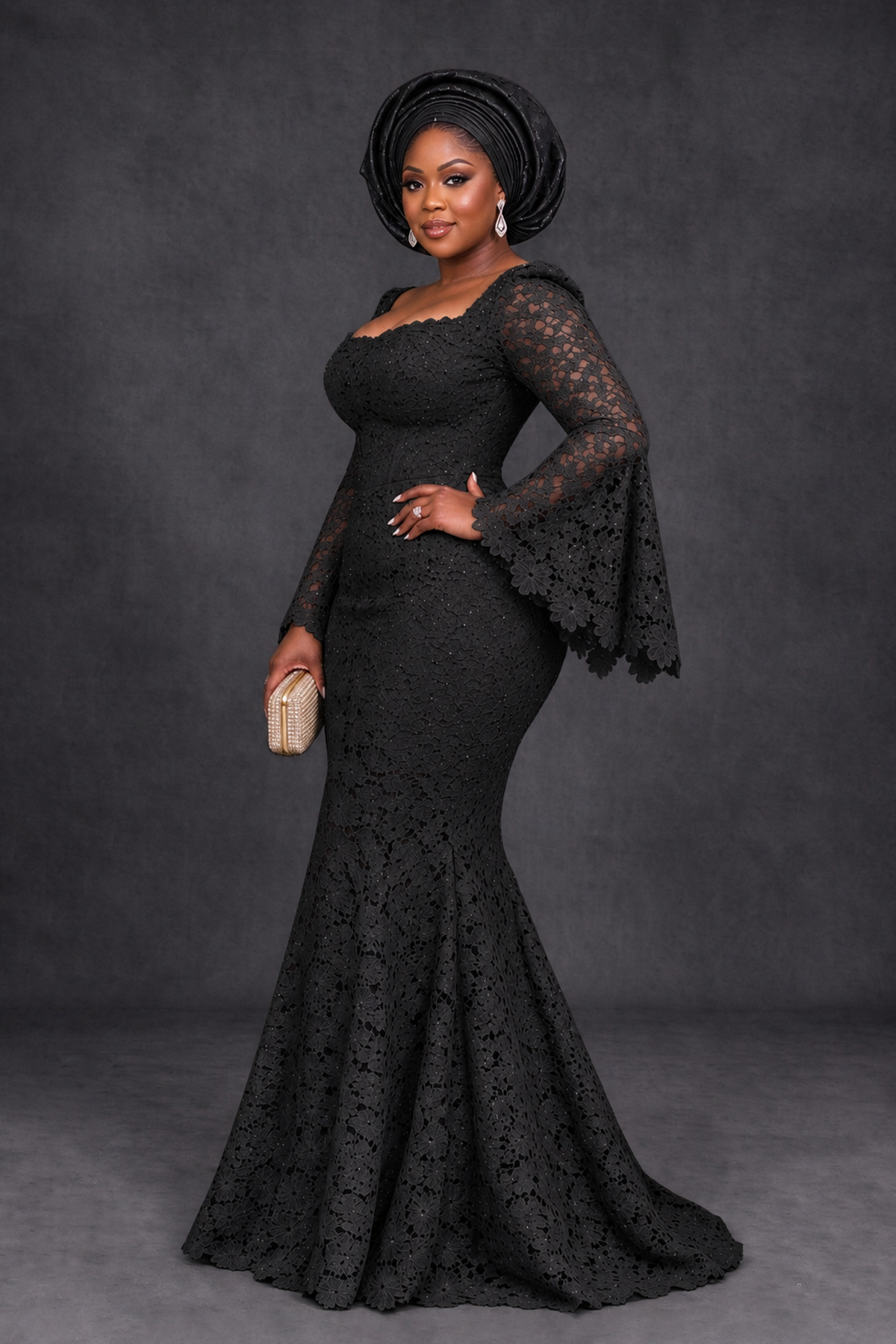 BOLODOO XX104 black floral lace gown, three-quarter view showing long bell sleeves