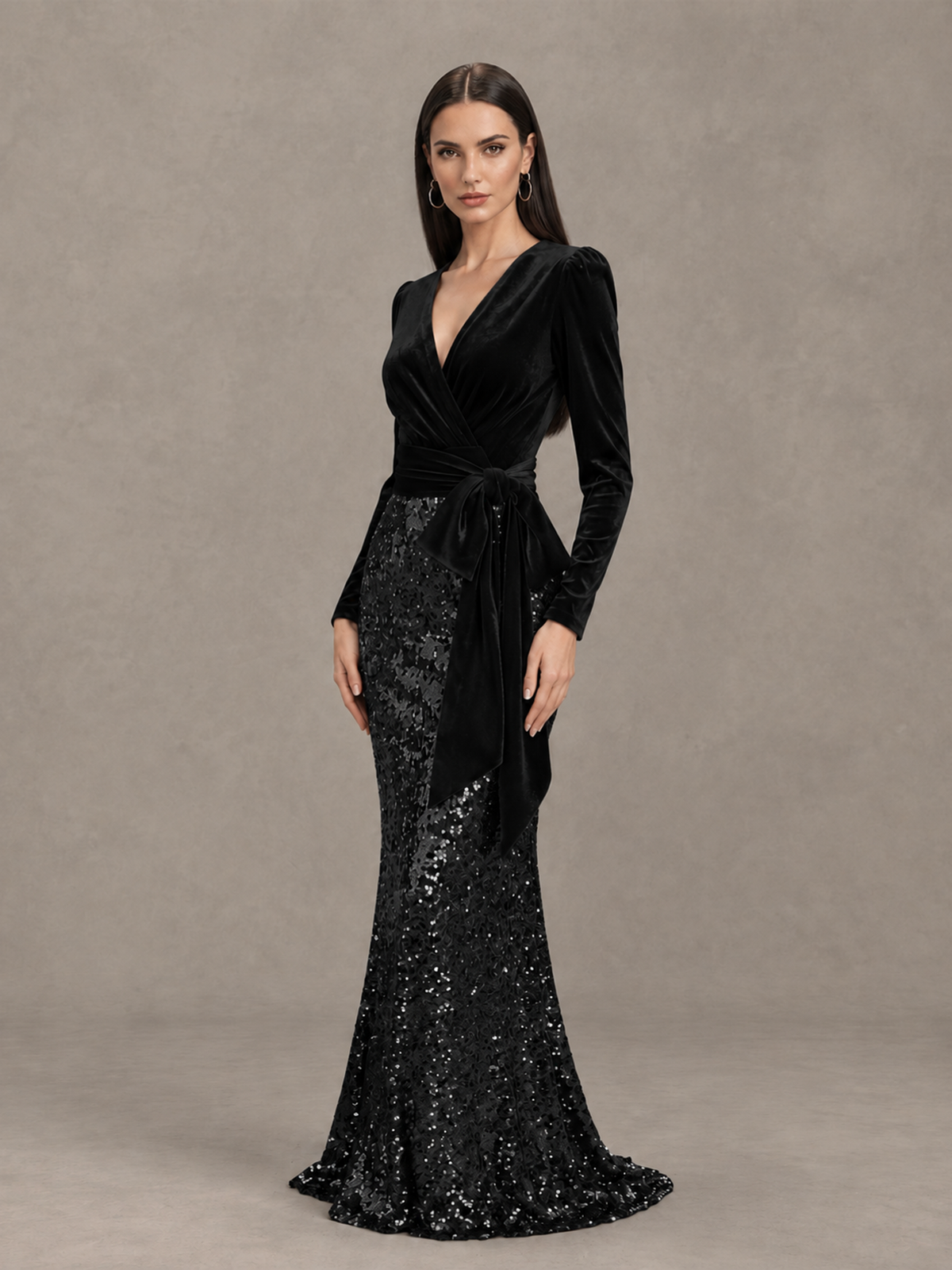BOLODOO black V-neck evening gown, angled view showing velvet-look bodice and draped side sash