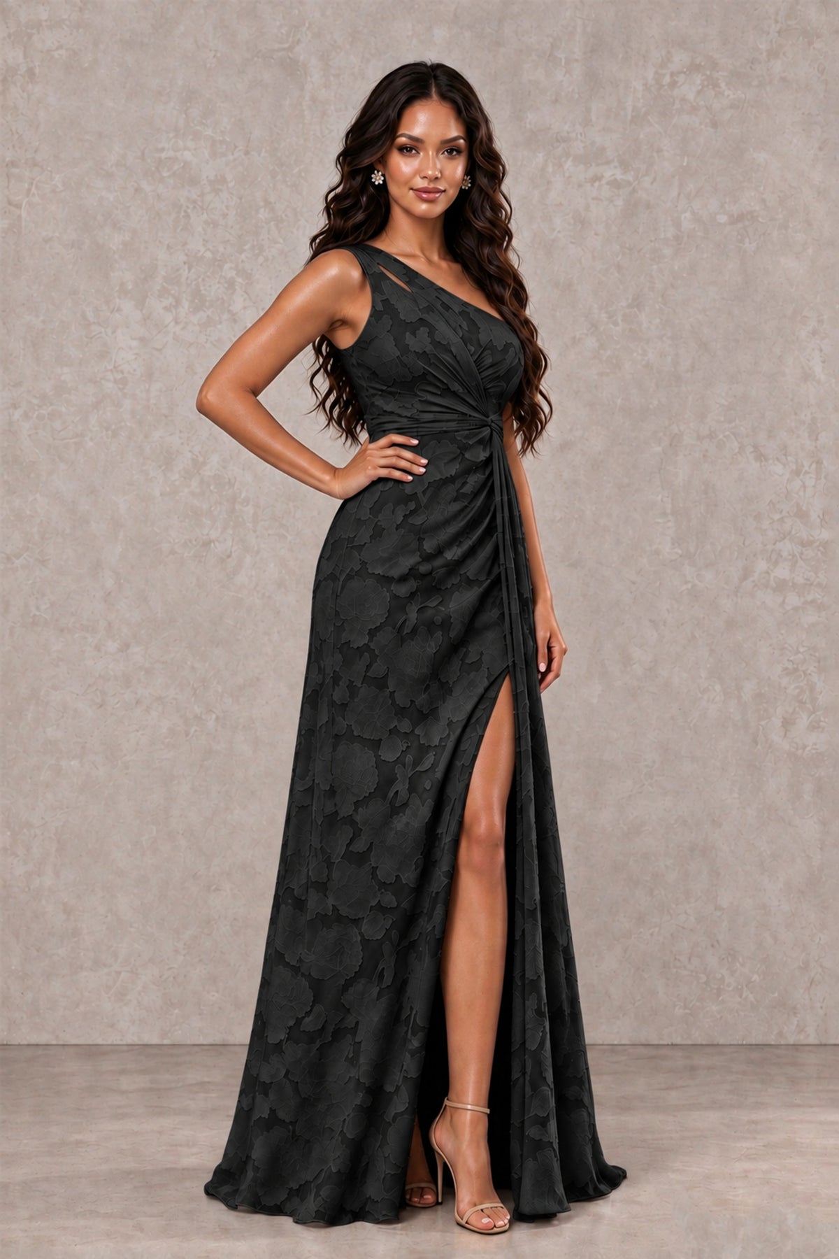BOLODOO FQ0069 black sleeveless floor-length gown, three-quarter view showing floral texture and draped skirt