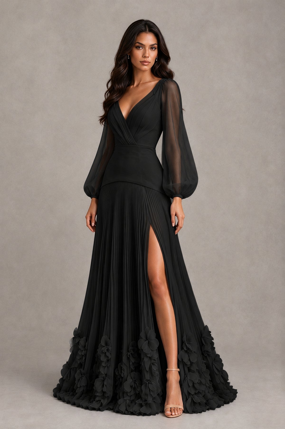 Black long balloon sleeve A-line evening gown with thigh-high slit and petal ruffle hem, angled view