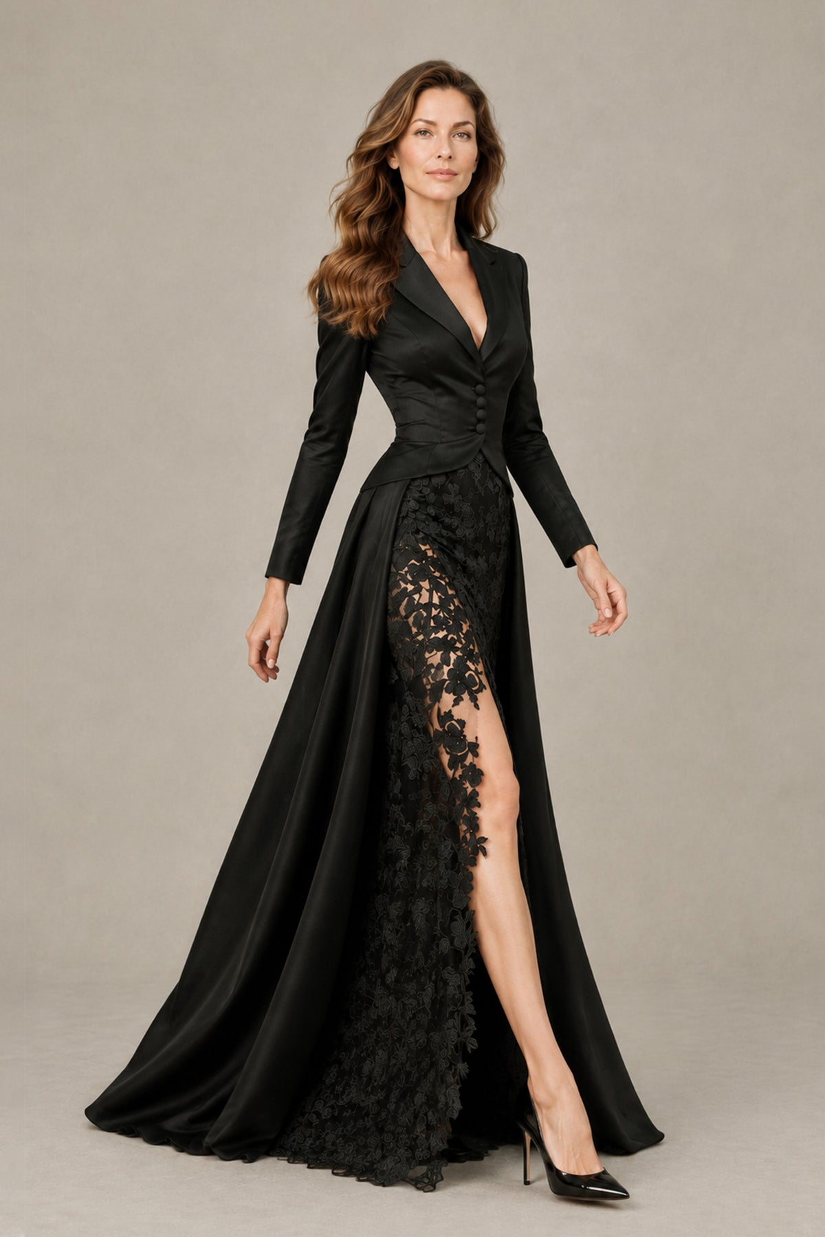 BOLODOO black floor-length blazer gown, angled front view with floral lace and high front slit