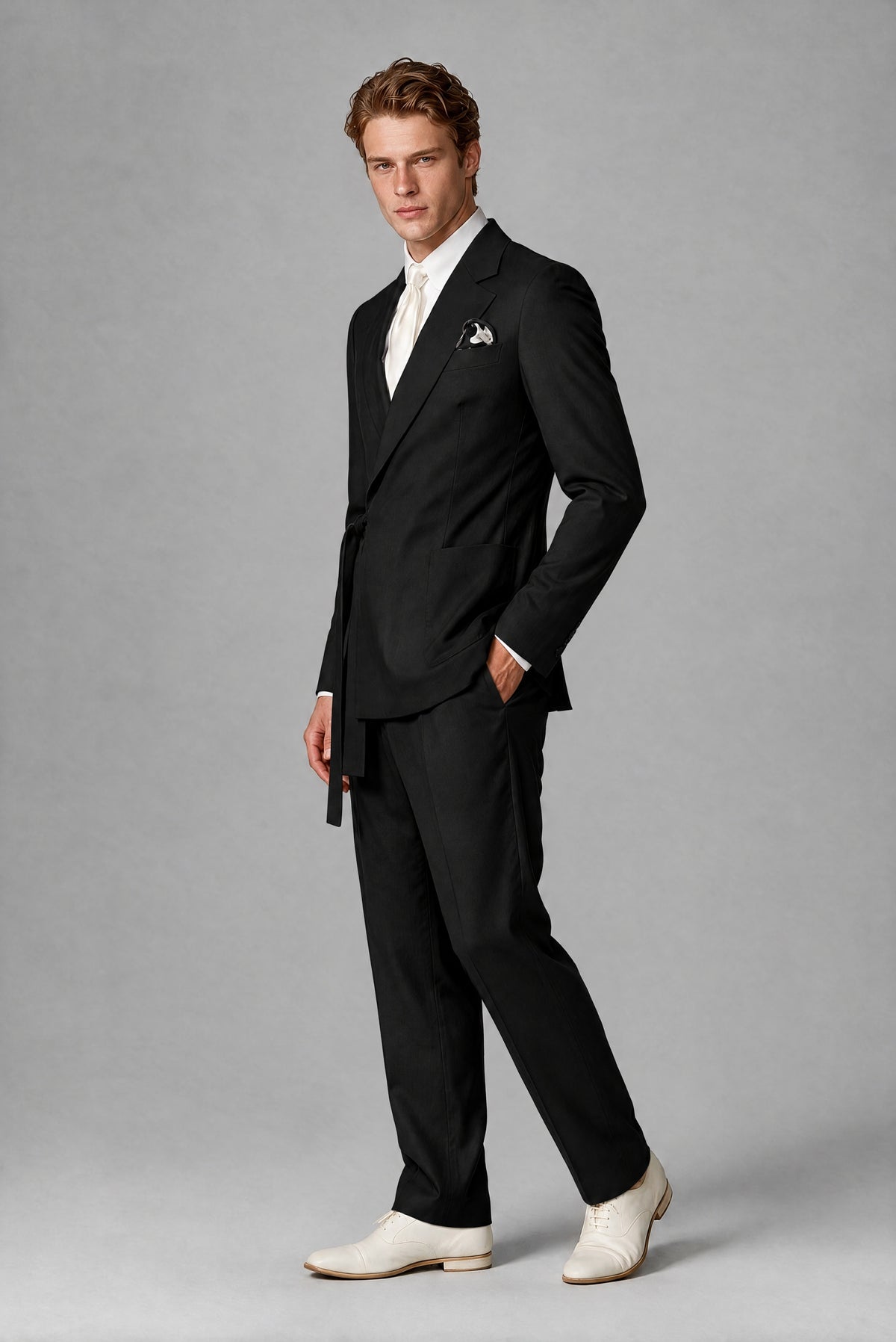 Bolodoo black wrap-front suit jacket showing lapels, long sleeves and side waist tie