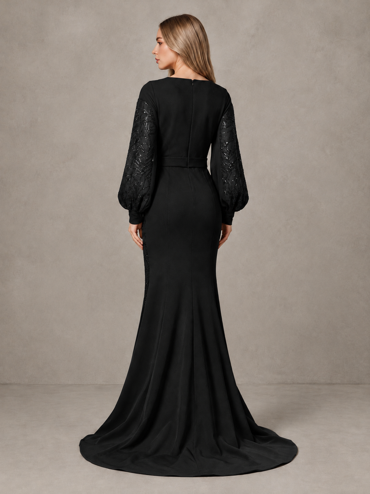 Back view of BOLODOO black mermaid evening gown with covered back and long bishop sleeves