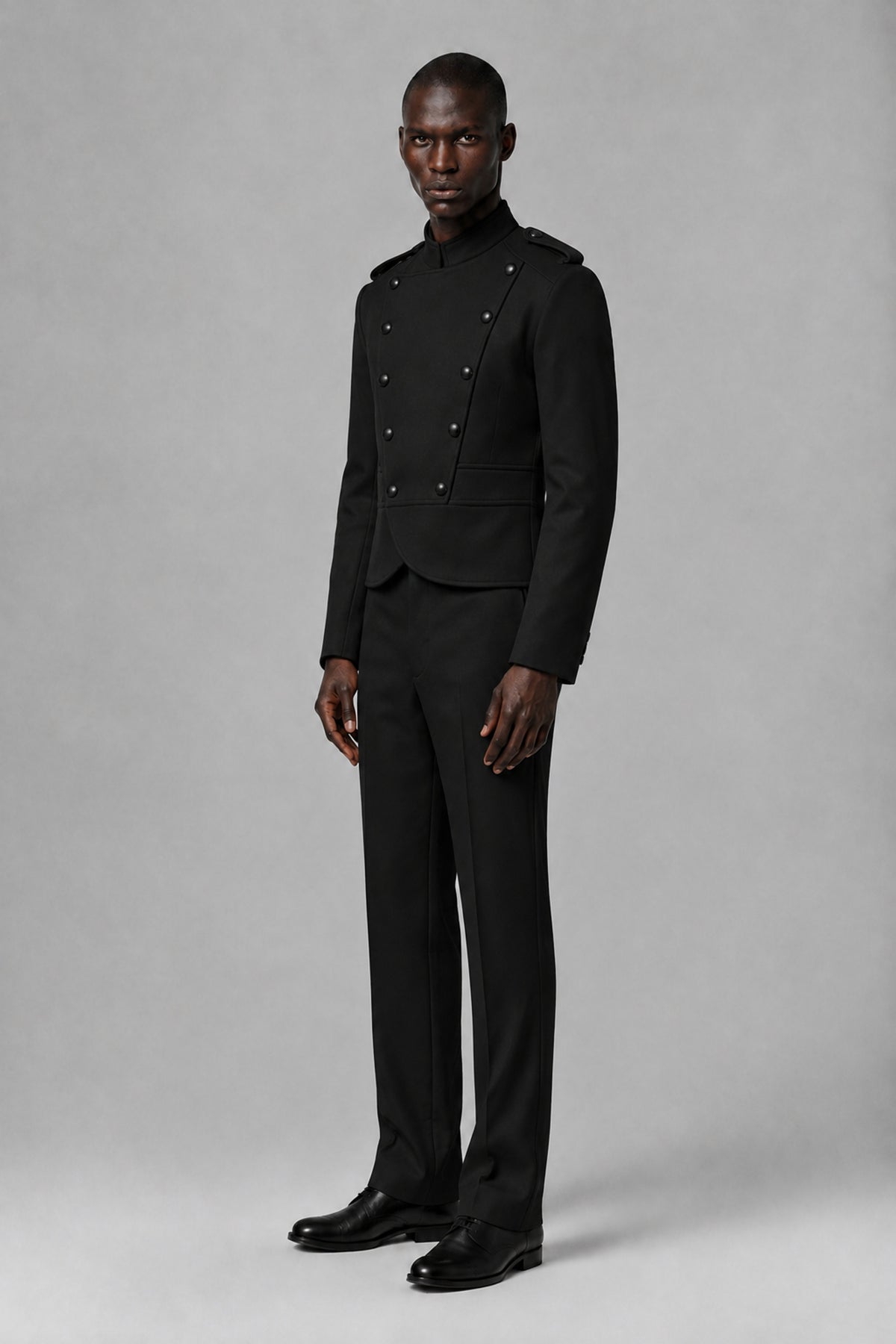 Bolodoo FQ1022 black two-piece men's suit with straight-leg trousers, three-quarter view