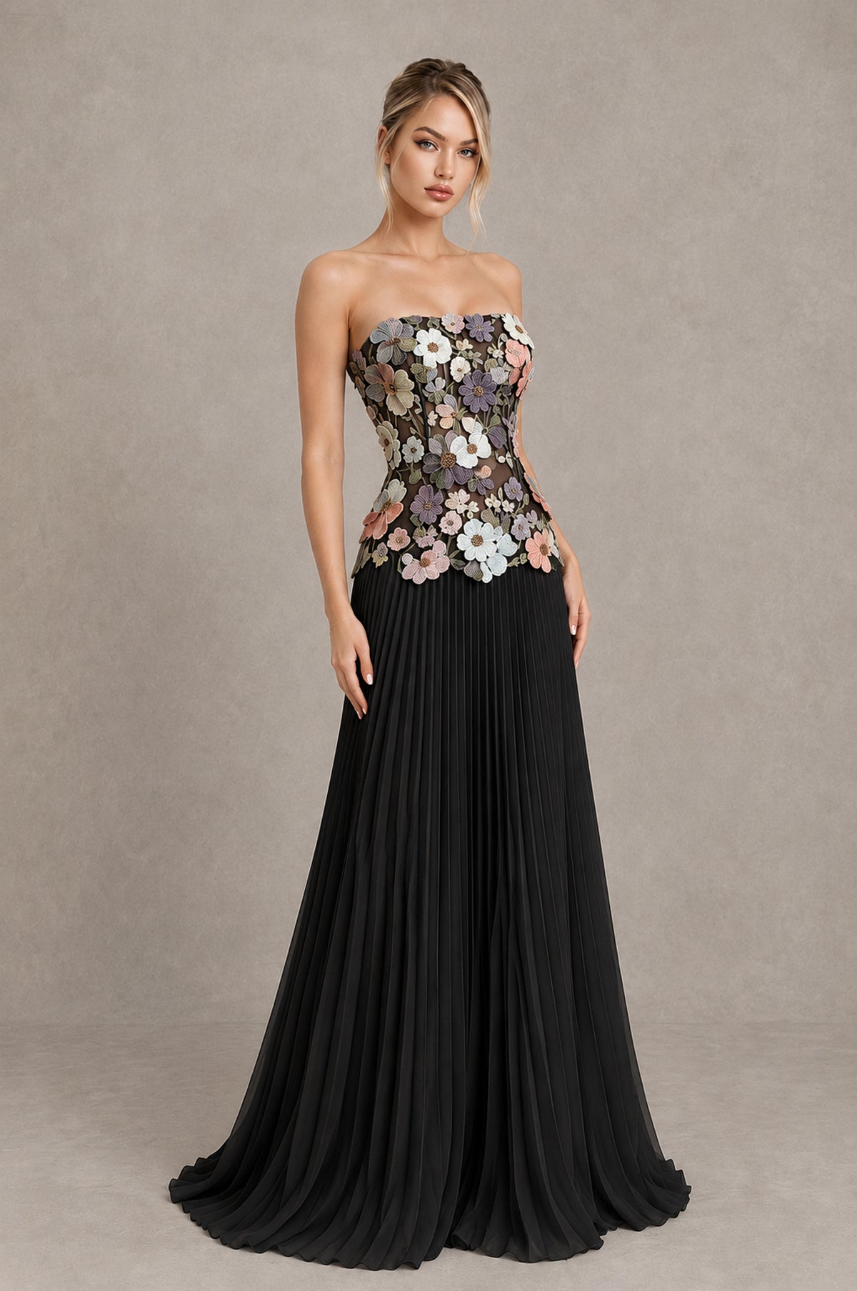 Black Blue strapless floral bodice and floor-length pleated evening gown, angled front view