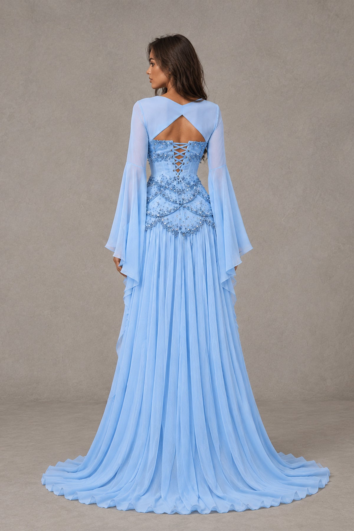 Back view of BOLODOO light blue evening gown showing open-back cutout, lace-up detailing and train