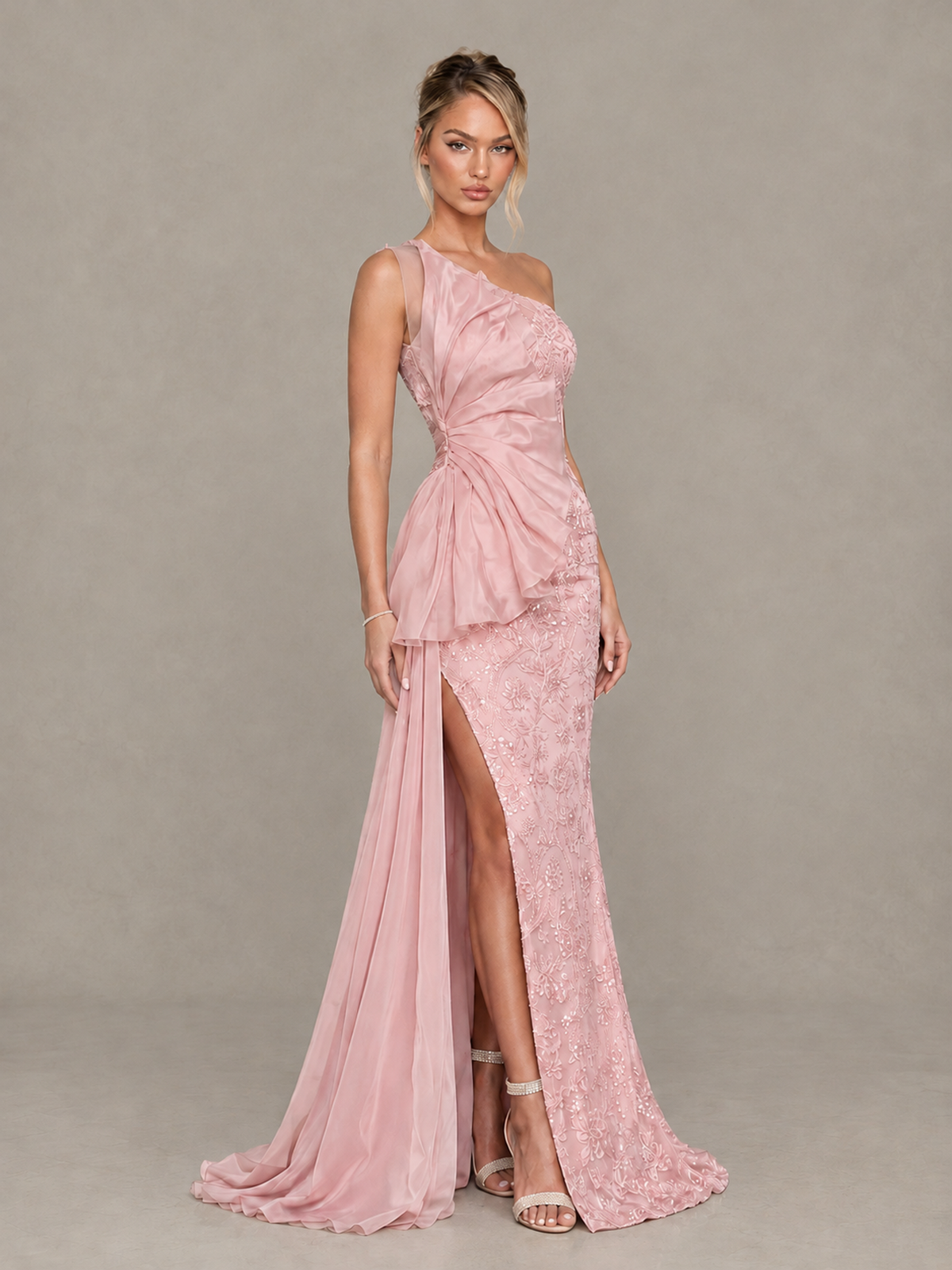 BOLODOO XCD008 one-shoulder pink gown, angled front view showing floral texture and thigh-high slit