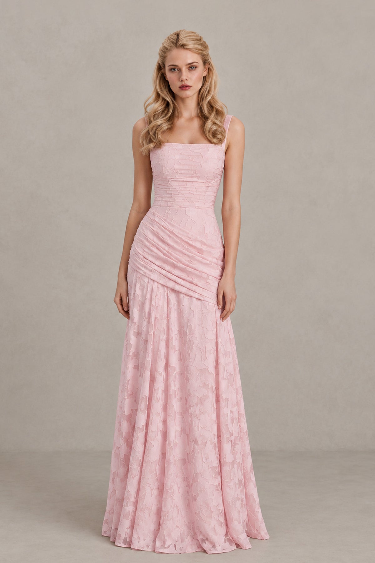 Back view of BOLODOO blush pink maxi dress showing crossed straps, open back and lace-up fastening