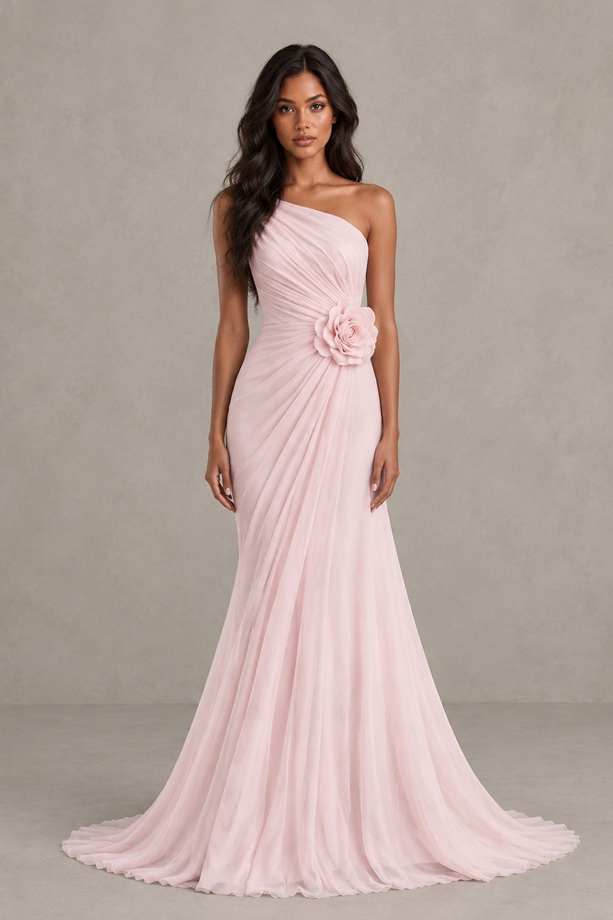BOLODOO blush pink one-shoulder floor-length gown front view with ruched bodice and floral waist appliqué