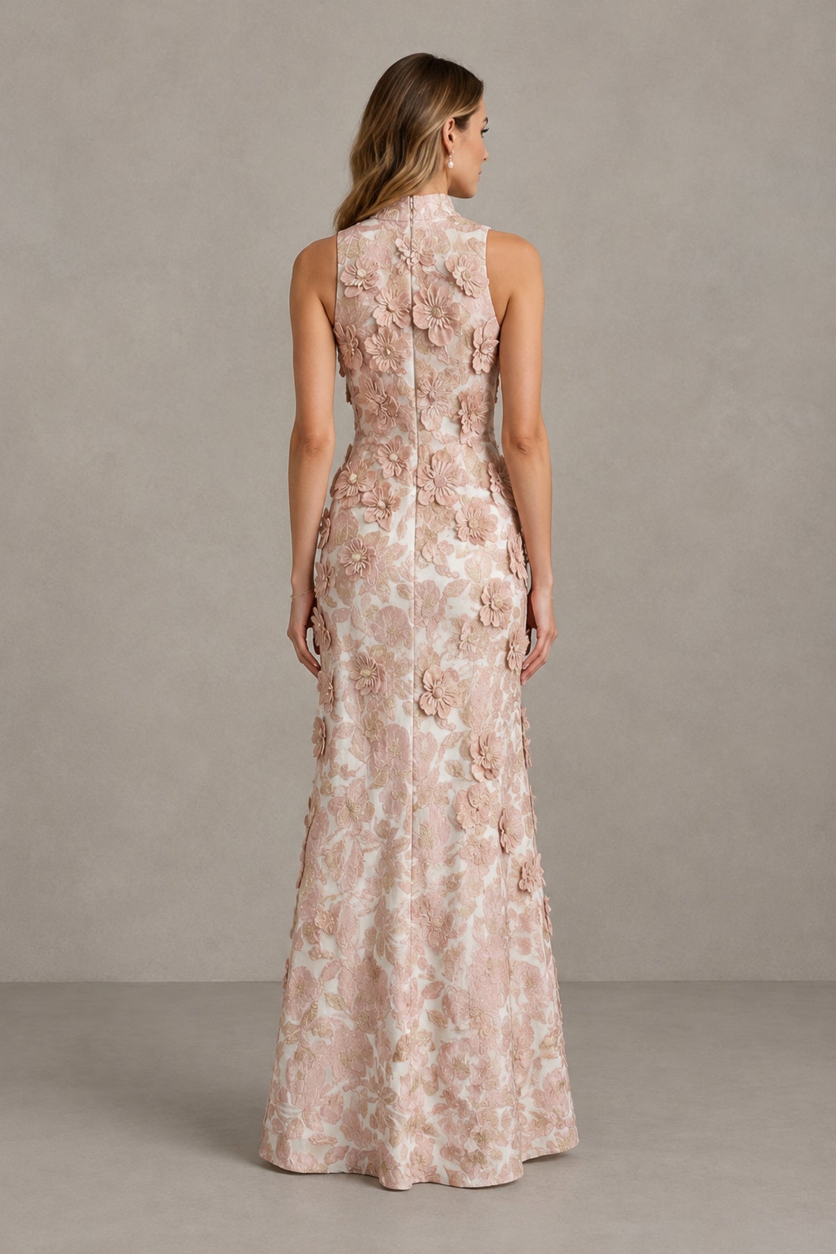 Back view of BOLODOO blush pink high-neck evening gown showing covered back and all-over floral details