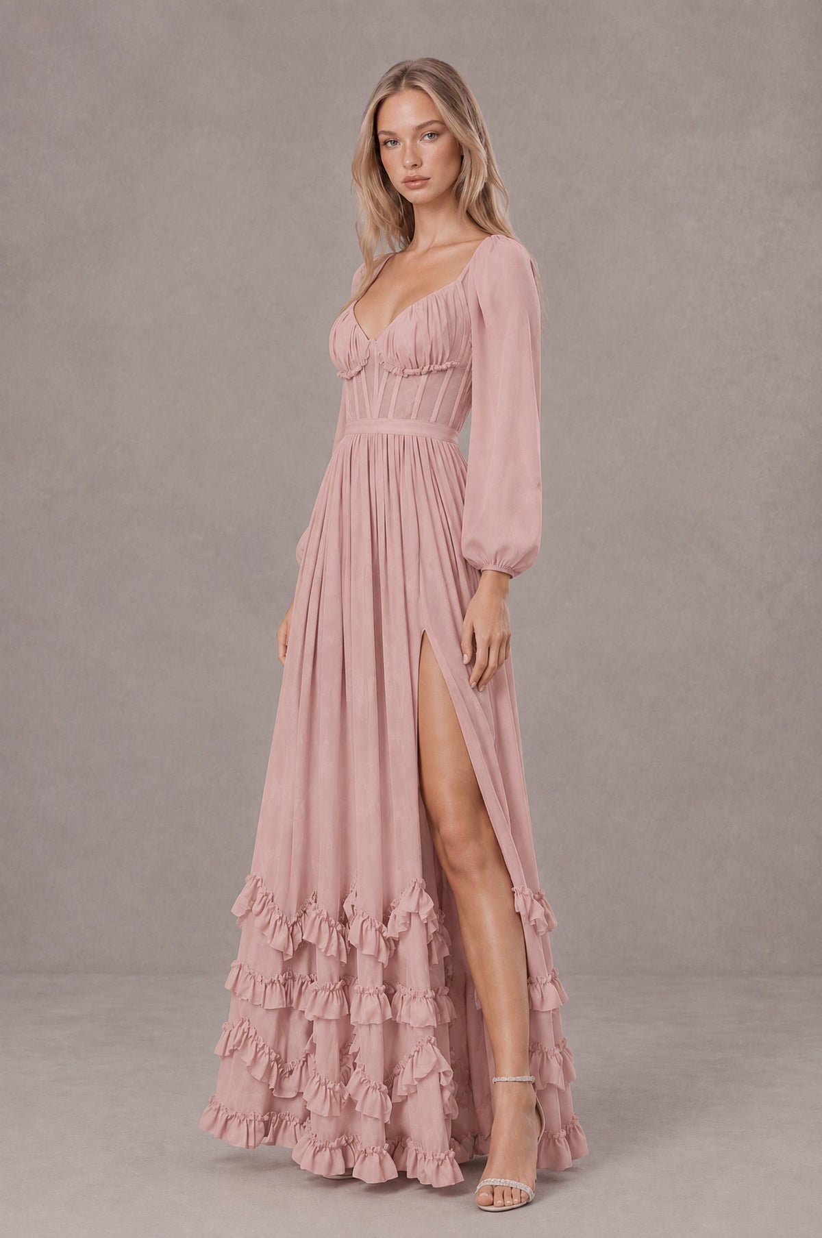 Side view of BOLODOO blush pink ruffle maxi dress with gathered bodice and slit