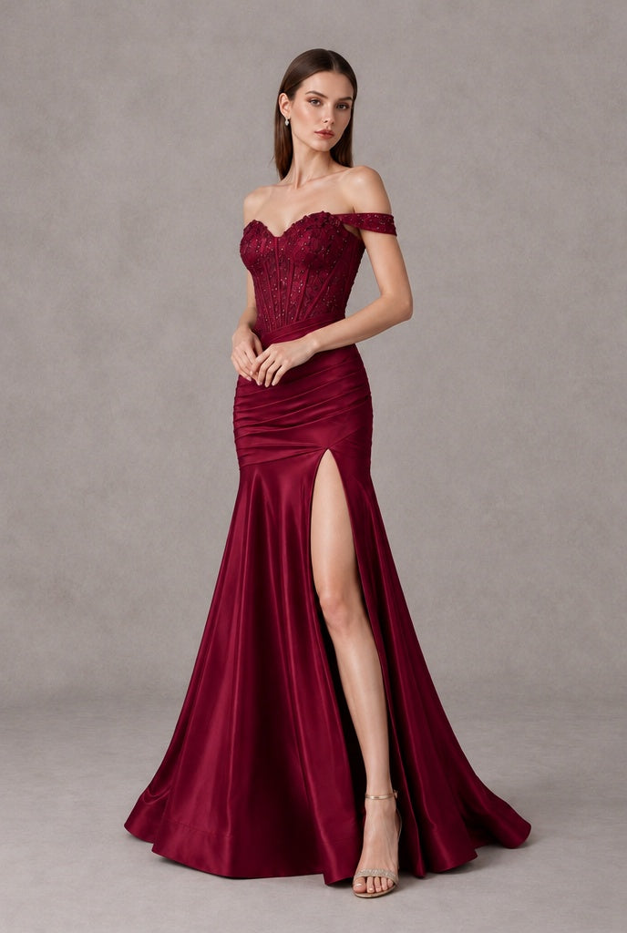 Burgundy mermaid evening gown with embellished corset-style bodice and ruched satin-look skirt, three-quarter front view