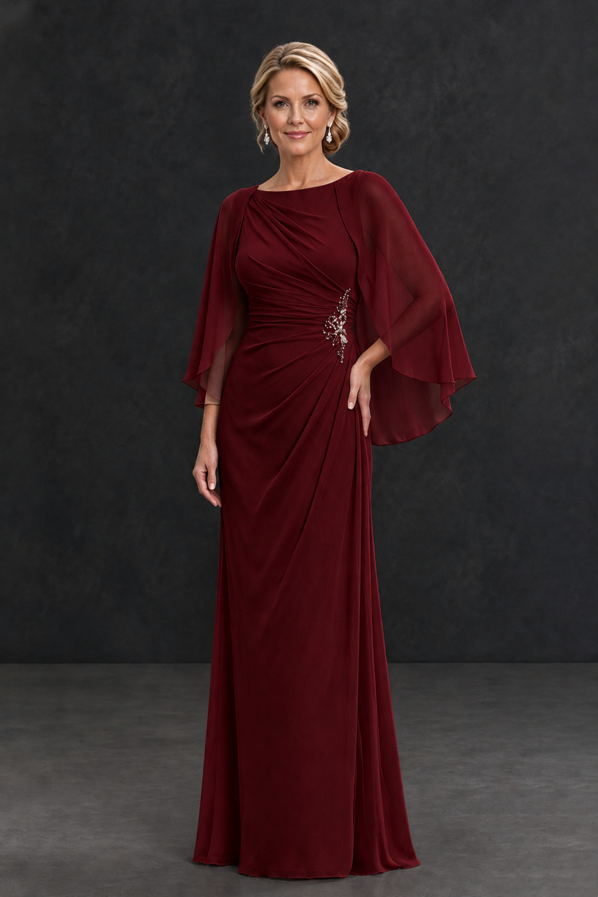 BOLODOO XX111 burgundy mother of the bride dress, front view with cape sleeves and embellished ruched waist