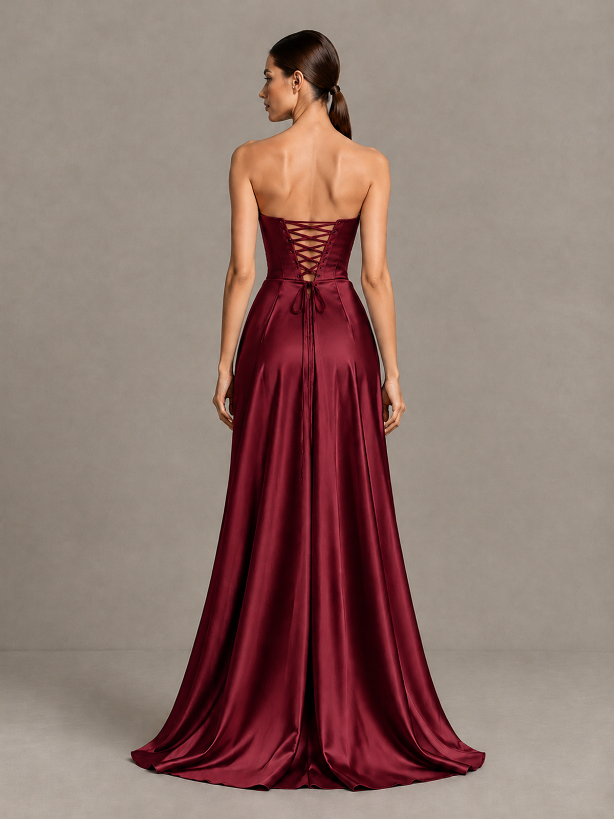 Back view of BOLODOO burgundy satin-look prom dress with lace-up back and sweep train