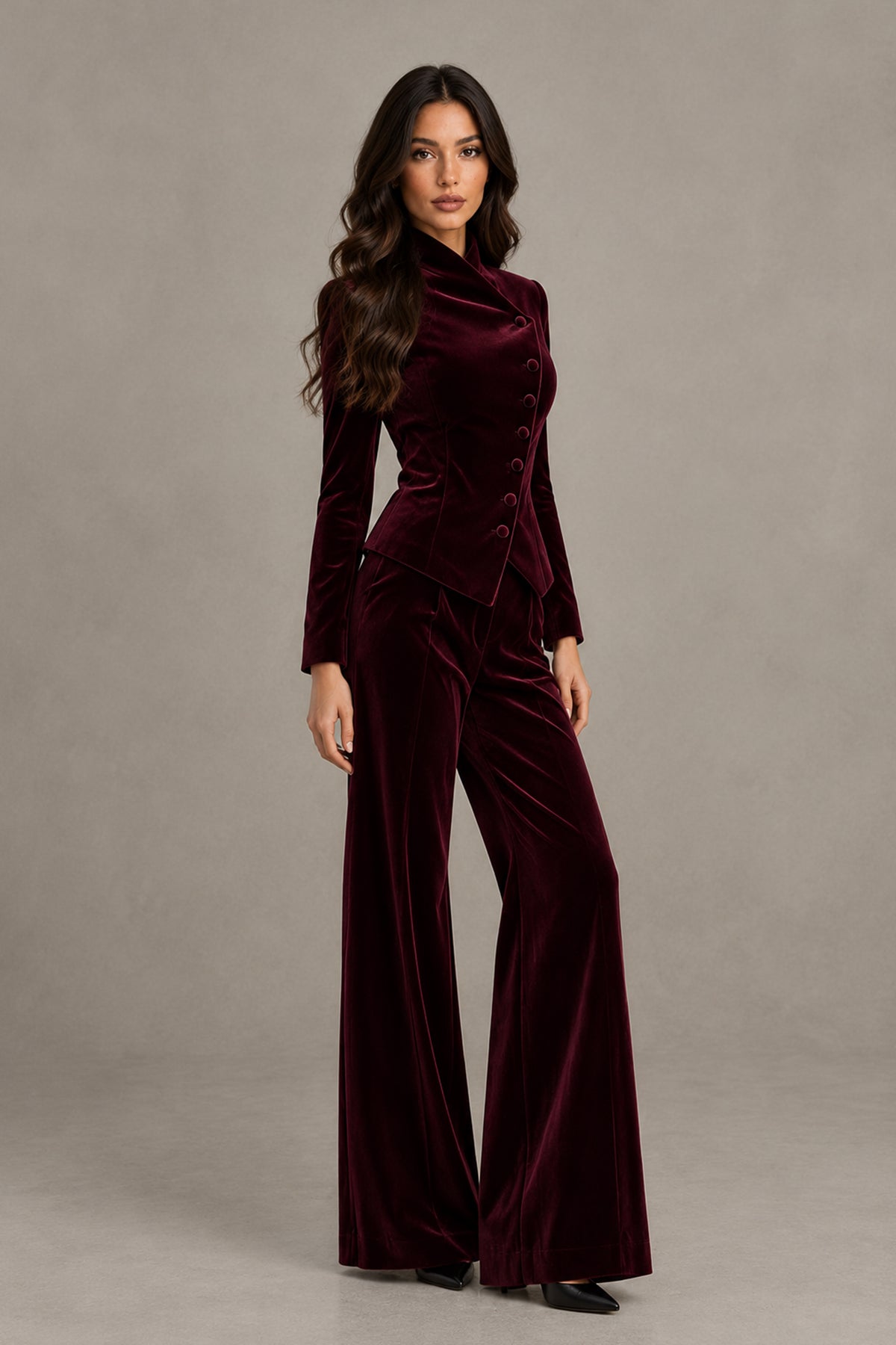 BOLODOO burgundy women's pantsuit, front walking view showing asymmetric button-detail blazer