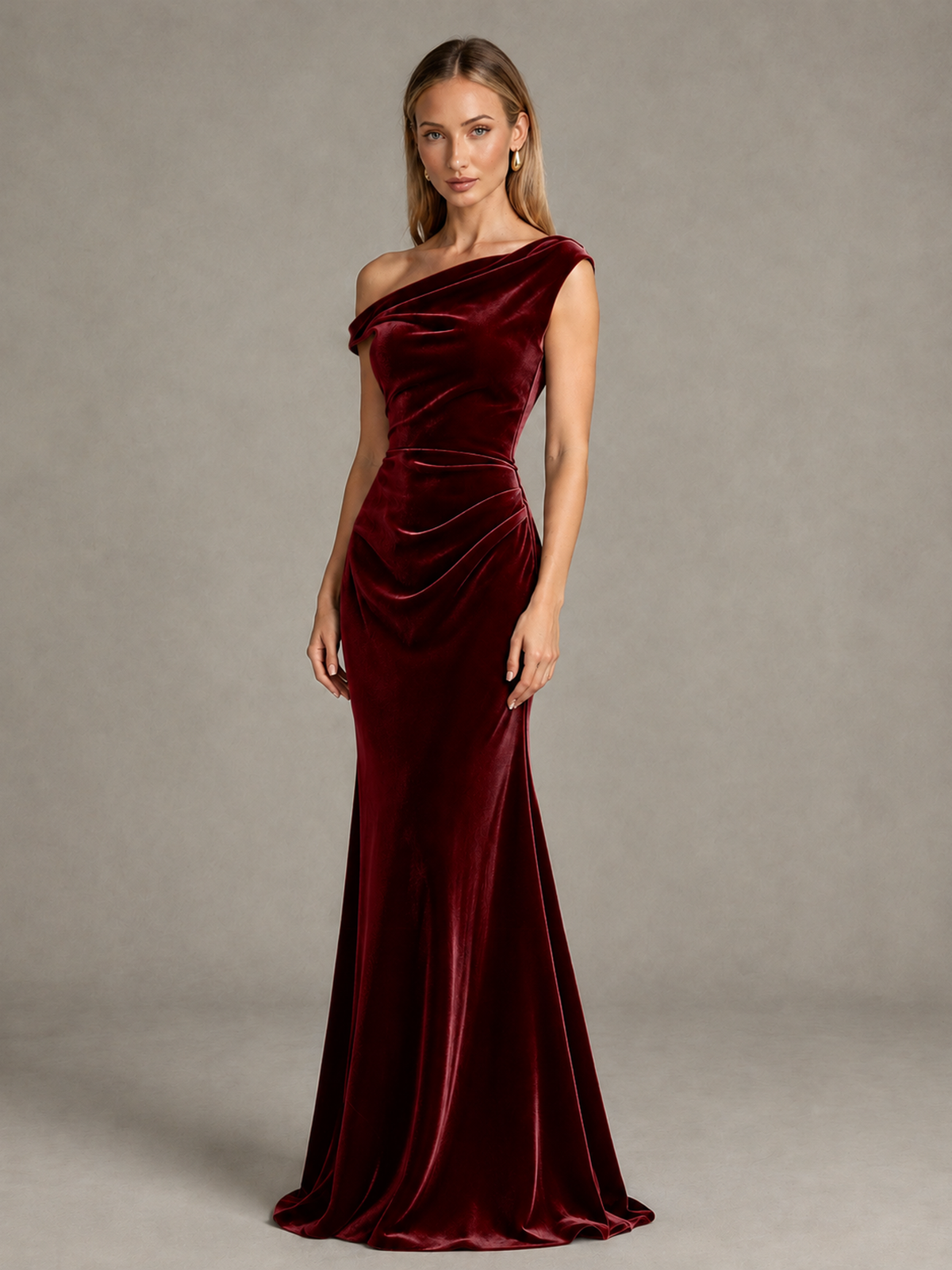 Burgundy velvet evening gown three-quarter view showing ruched waist