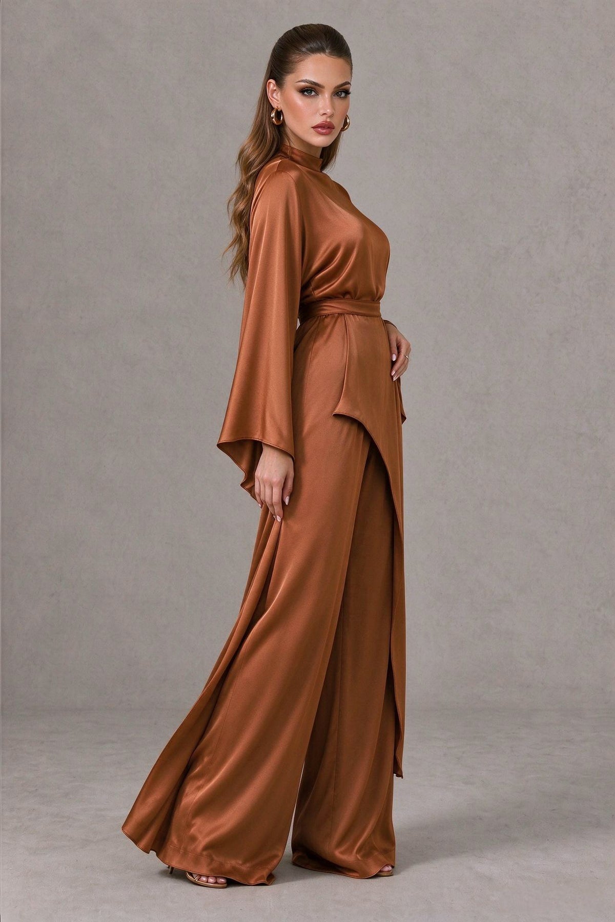 BOLODOO QQ076 satin-look long sleeve jumpsuit, side view of draped waist overlay