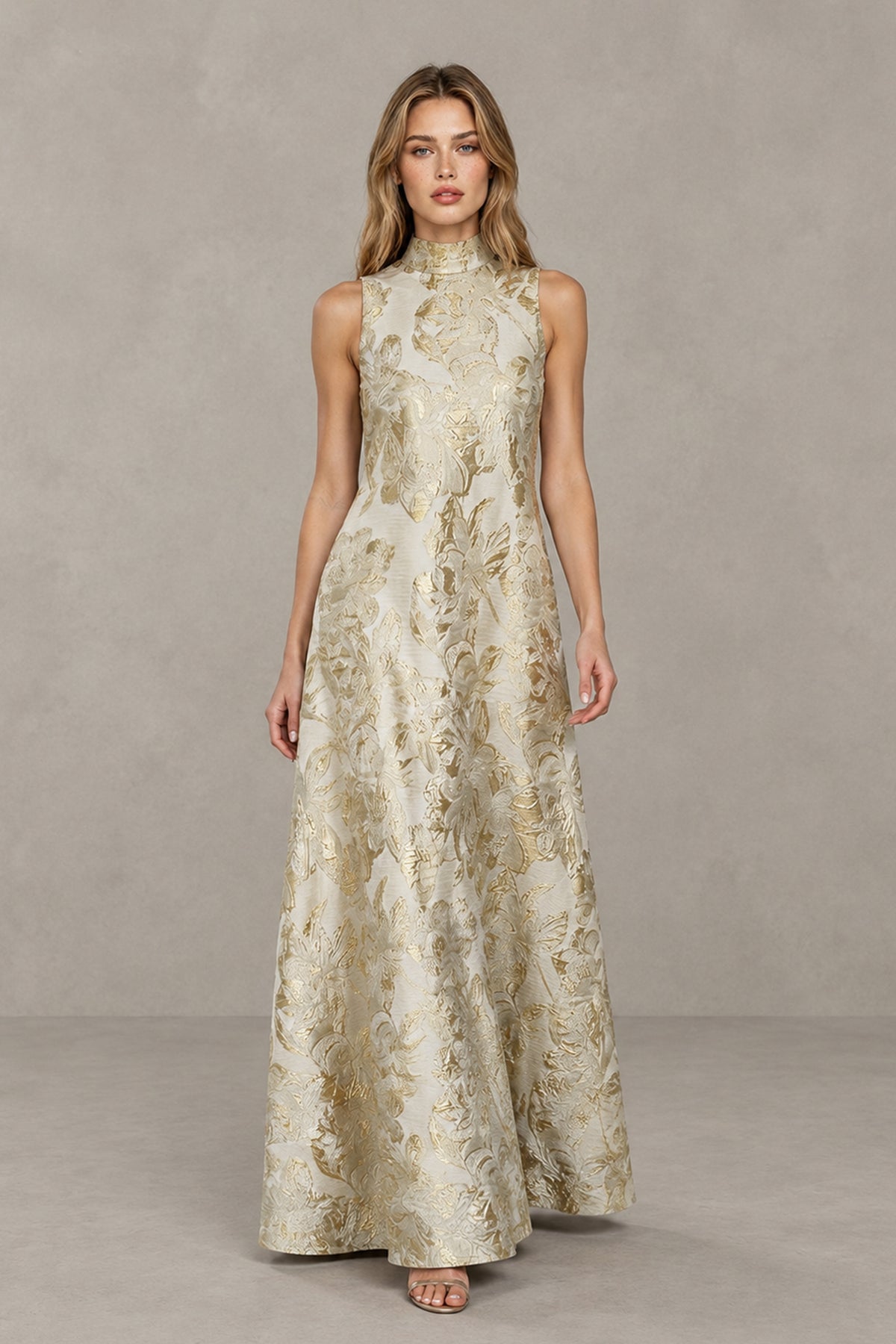 Full front view of the BOLODOO champagne ivory metallic floral jacquard maxi dress with high neckline and A-line skirt