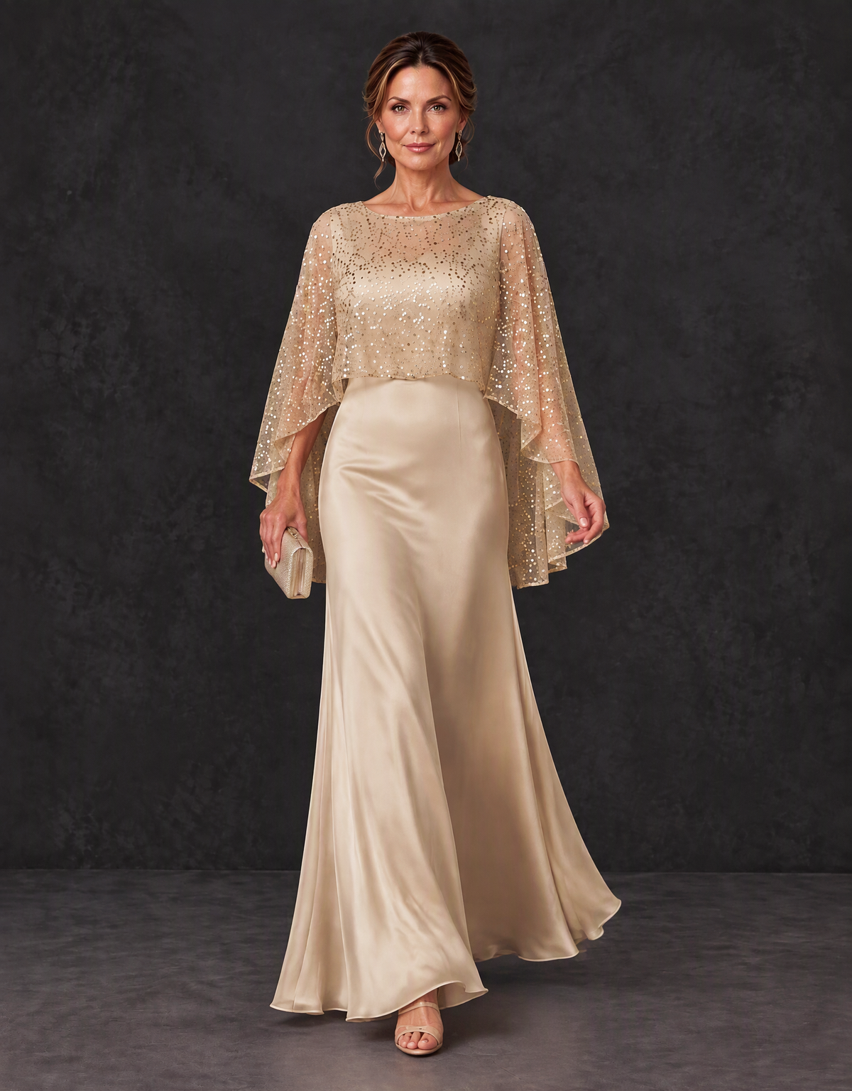 BOLODOO champagne cape sleeve mother of the bride dress showing the gently flared skirt in motion, walking front view