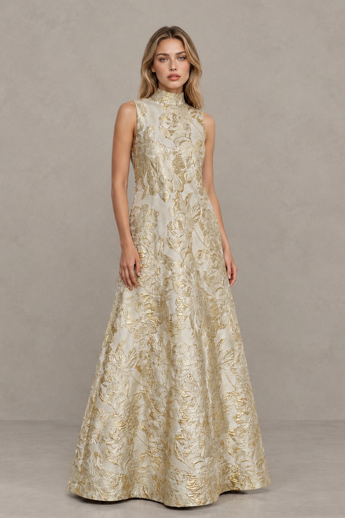 Champagne gold floral brocade sleeveless high neck A-line gown, three-quarter front view showing full floor-length skirt