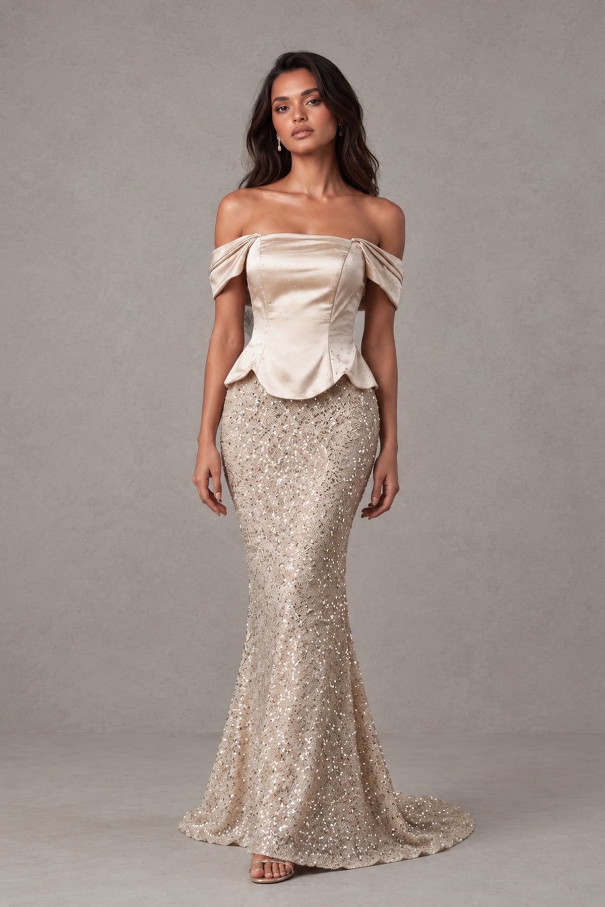 Champagne floor-length mermaid gown with straight neckline and sparkling skirt, walking front view