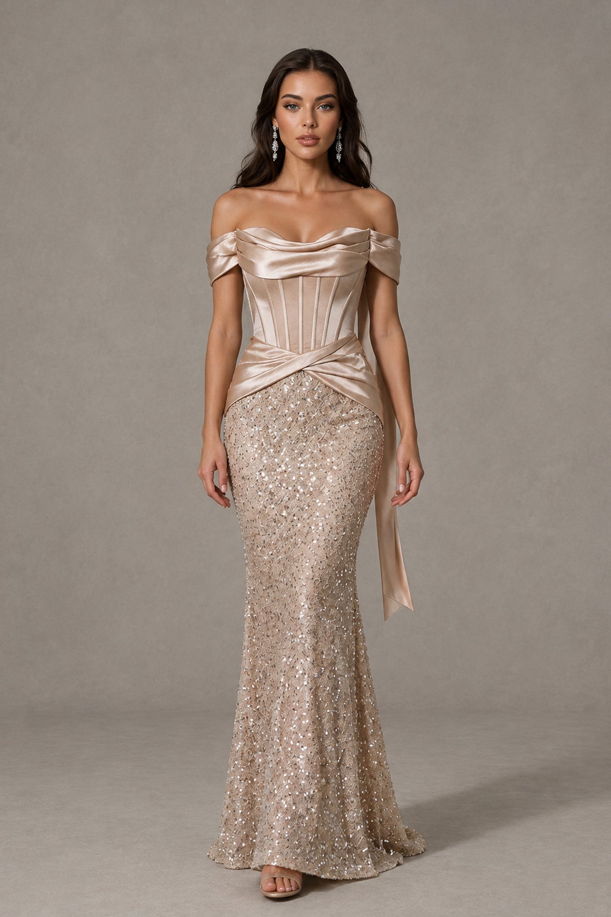 Champagne floor-length sequin mermaid gown with draped corset bodice, walking front view