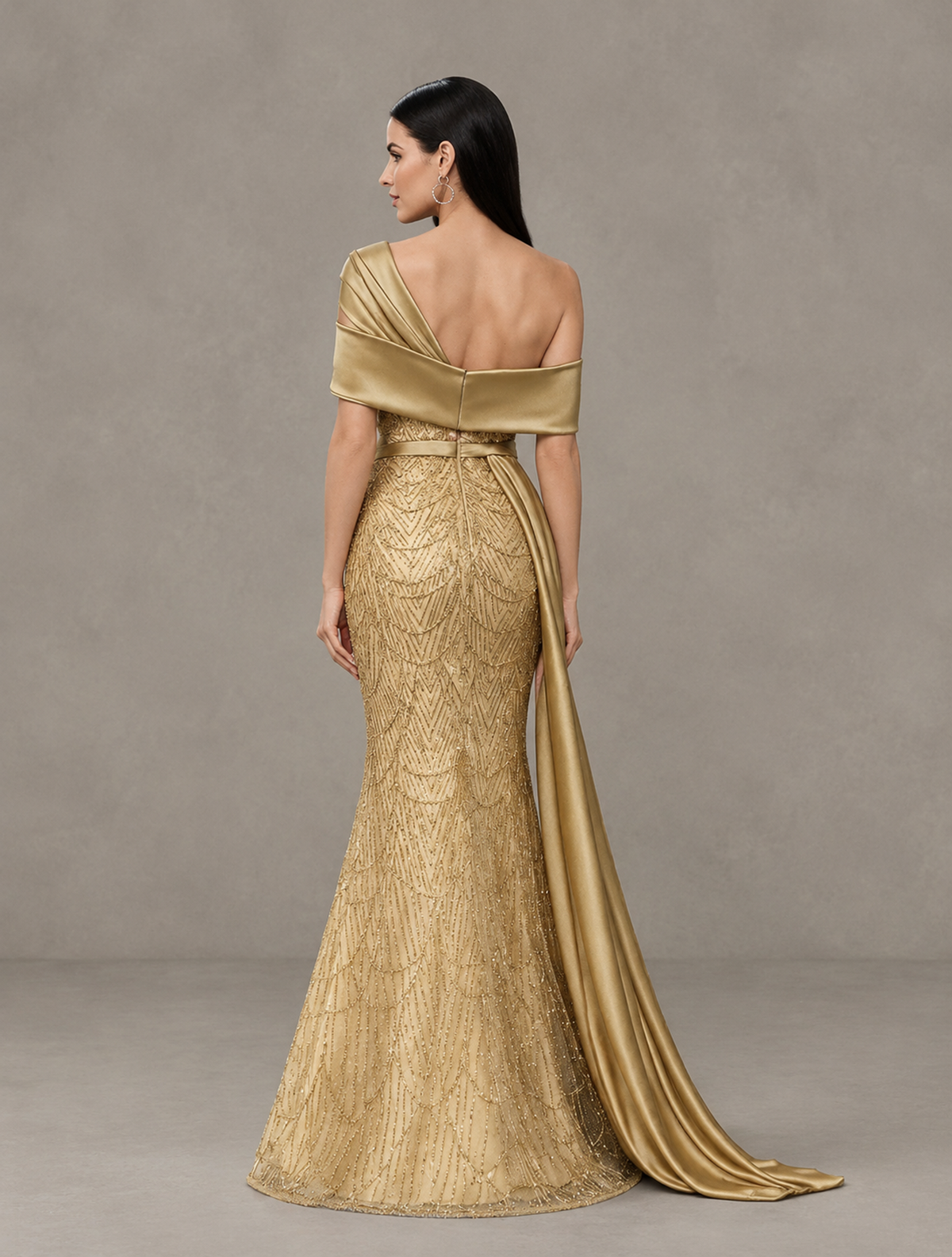 Back view of BOLODOO XCD018 gold evening gown showing open upper back and patterned mermaid skirt