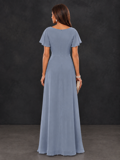 Back view of dusty blue formal maxi dress showing covered back and short flutter sleeves
