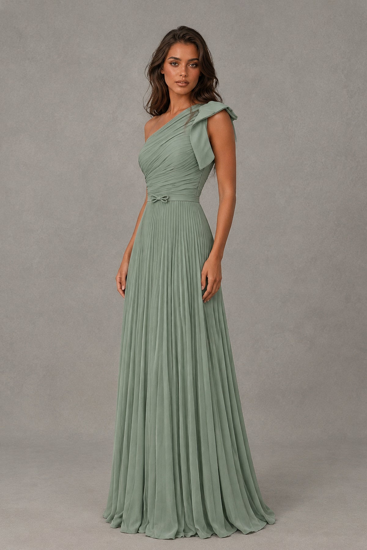 Angled view of BOLODOO dusty green one-shoulder maxi dress with ruched bodice and shoulder detail