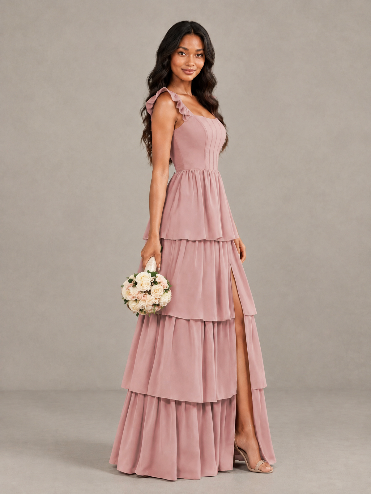 Dusty rose sleeveless floor-length tiered formal gown with high slit, full front view