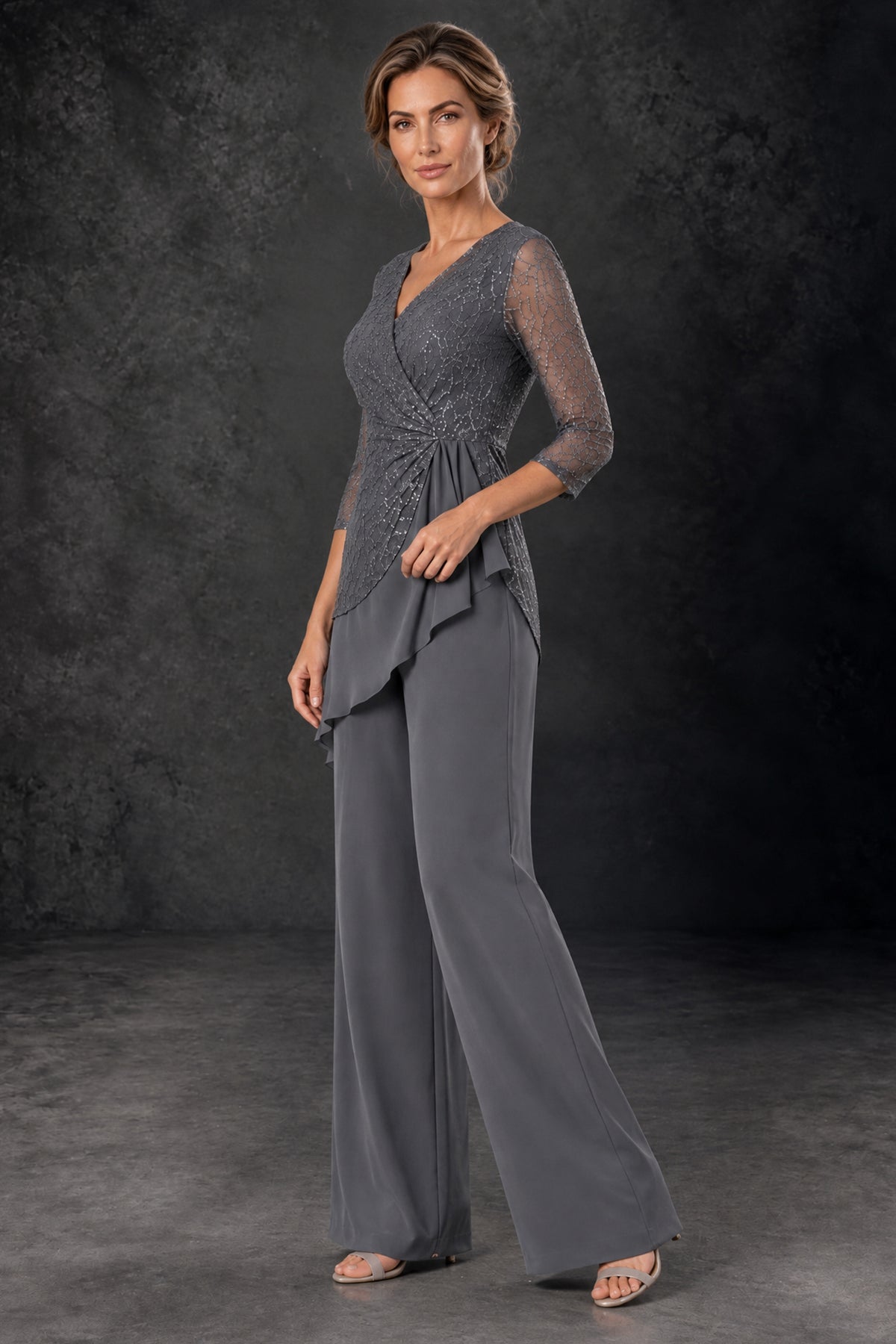 Side view of the BOLODOO grey sequin lace pant suit showing the draped chiffon overlay and full-length wide-leg trousers