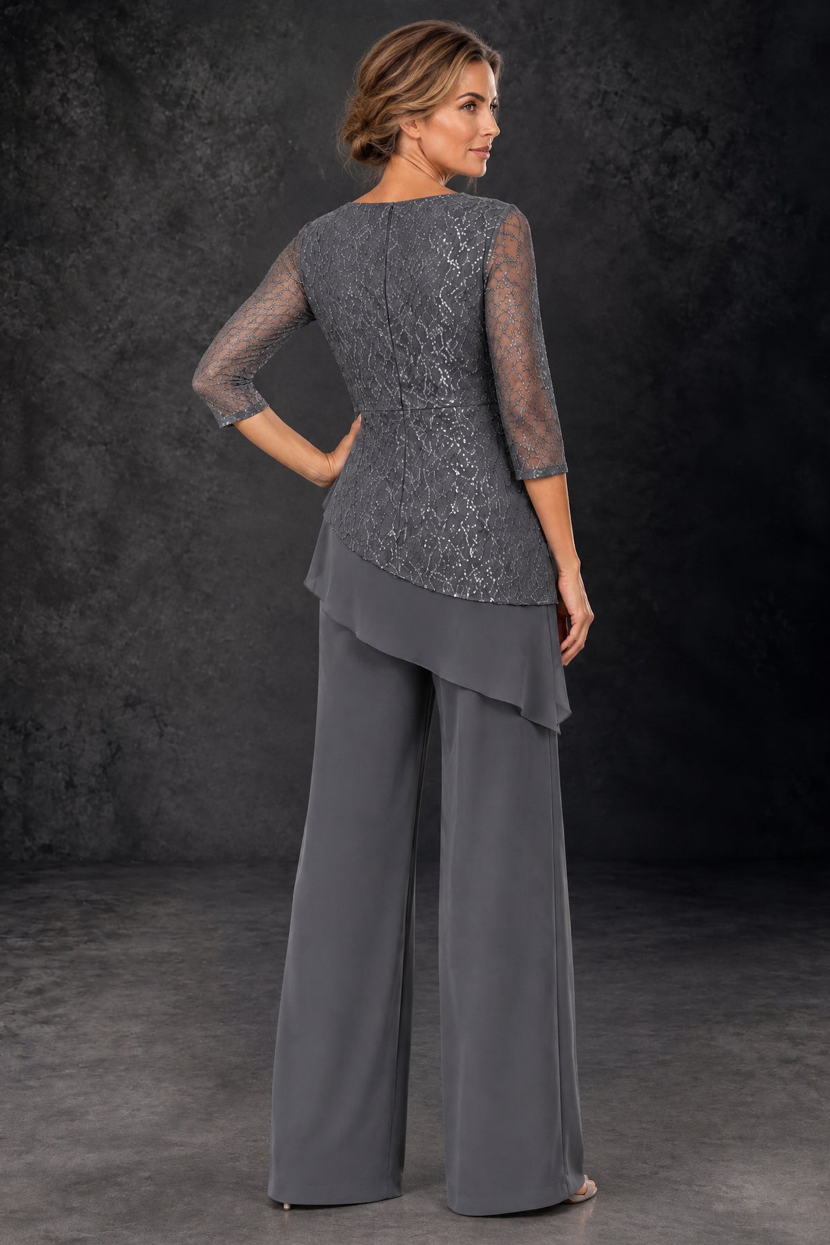 Back view of the BOLODOO grey mother of the bride pant suit with fully embellished sequin lace back and sheer 3/4 sleeves