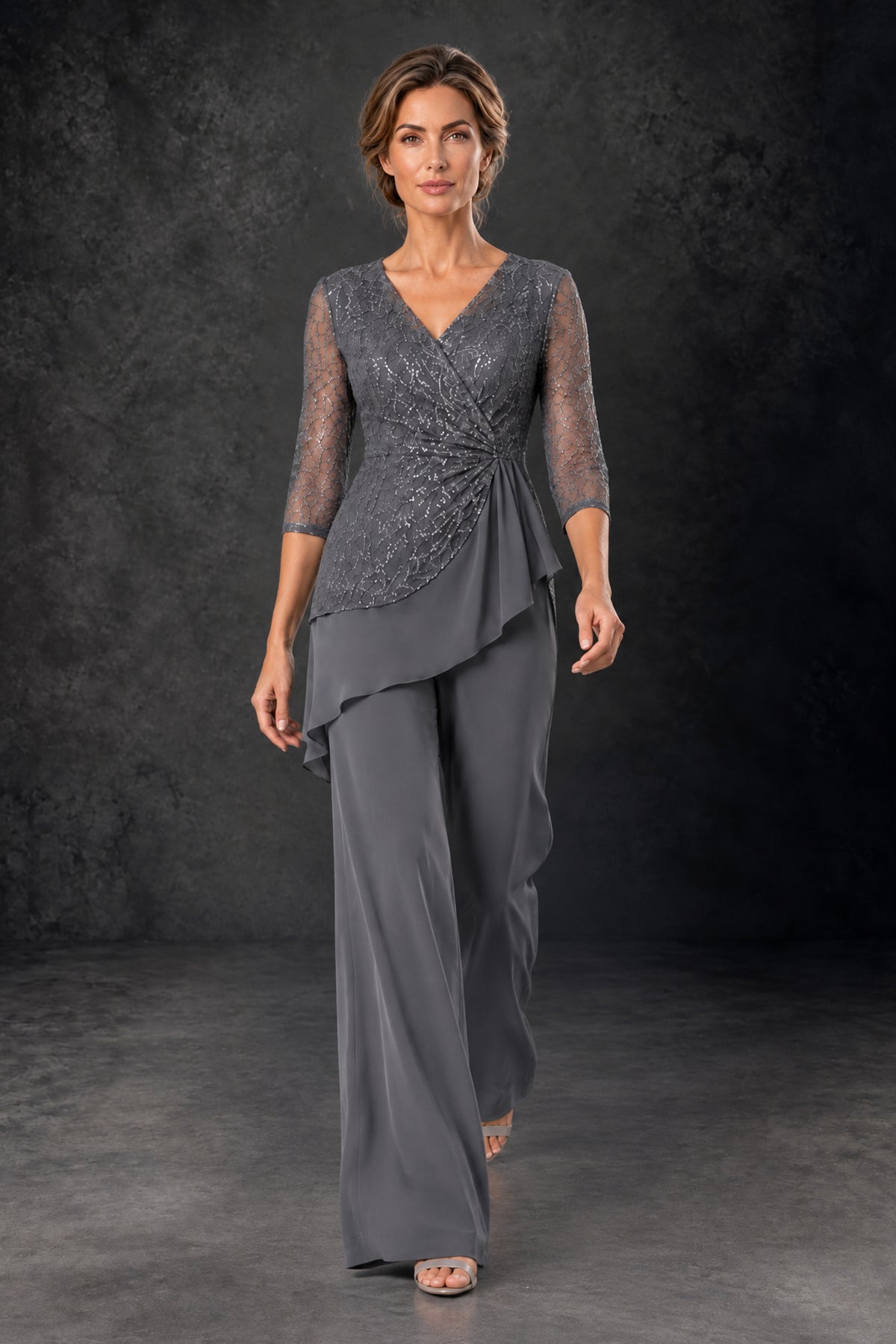 BOLODOO grey two piece pant suit with sequin lace bodice and flowing asymmetric chiffon overlay, front view