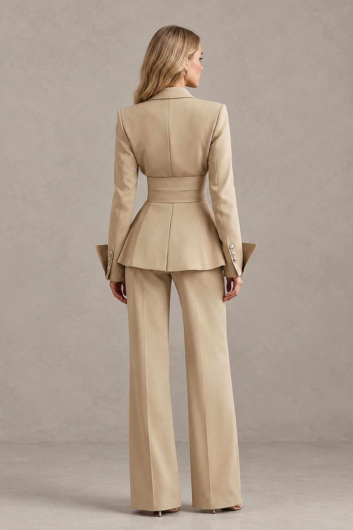 Back view of BOLODOO khaki peplum pantsuit showing covered back and full-length trousers