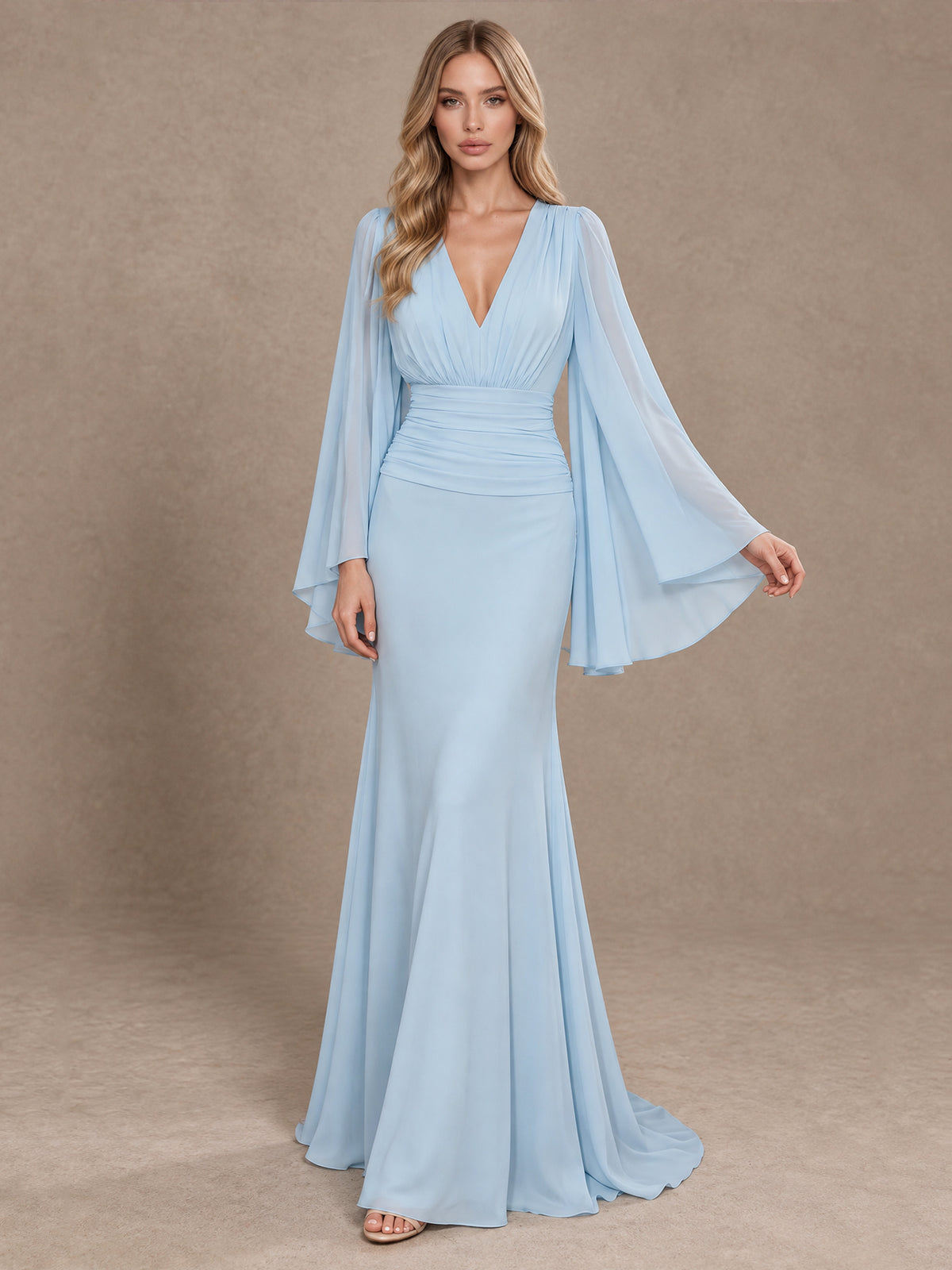Side view of the BOLODOO light blue formal dress showing the draped chiffon cape sleeve and floor-length skirt