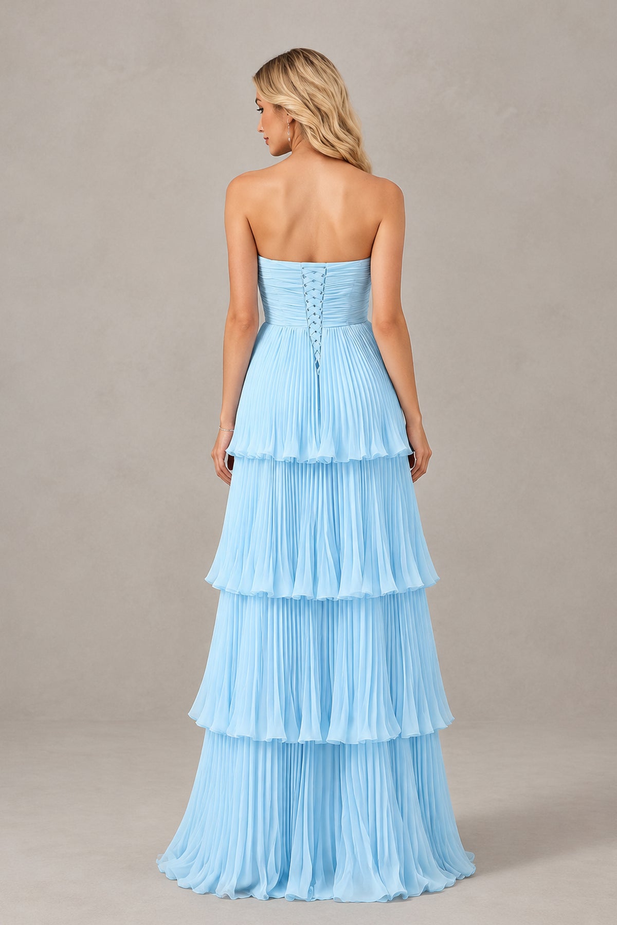 BOLODOO light blue ruched strapless gown with pleated tiered skirt angled view