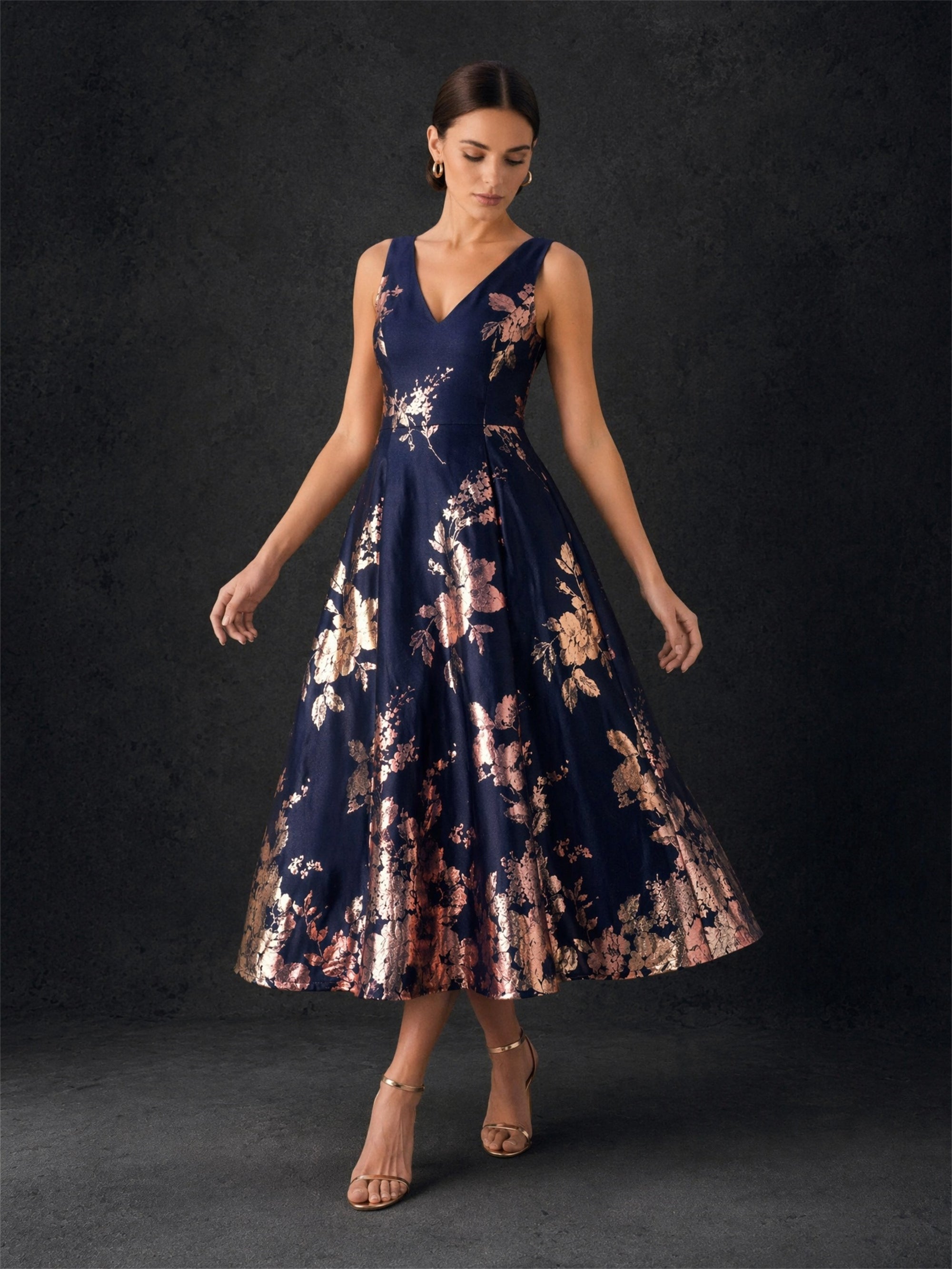 BOLODOO navy rose gold floral jacquard dress - three-quarter front view showing skirt movement