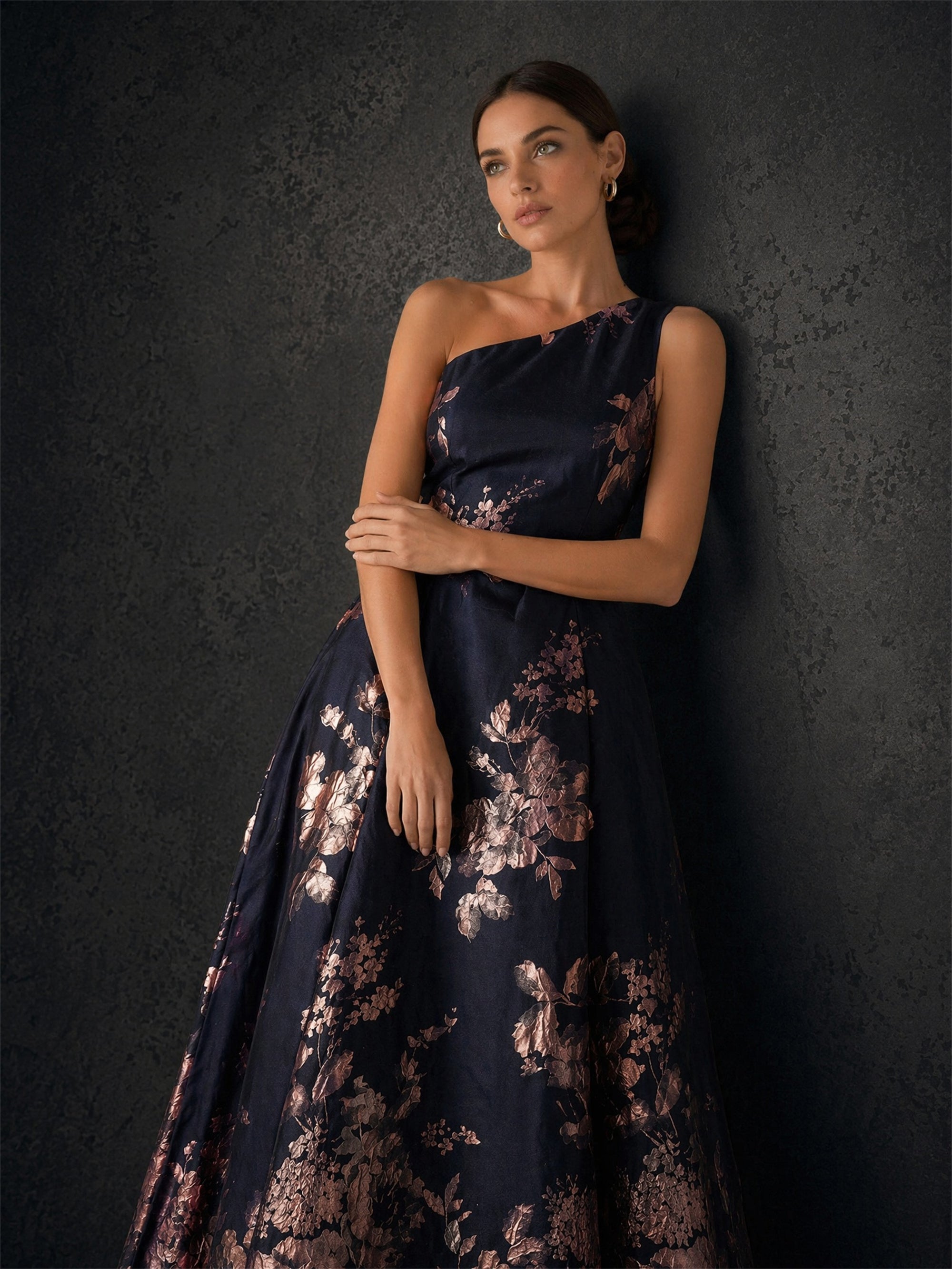 BOLODOO navy rose gold floral jacquard one-shoulder gown - upper body close-up showing one-shoulder neckline and jacquard detail