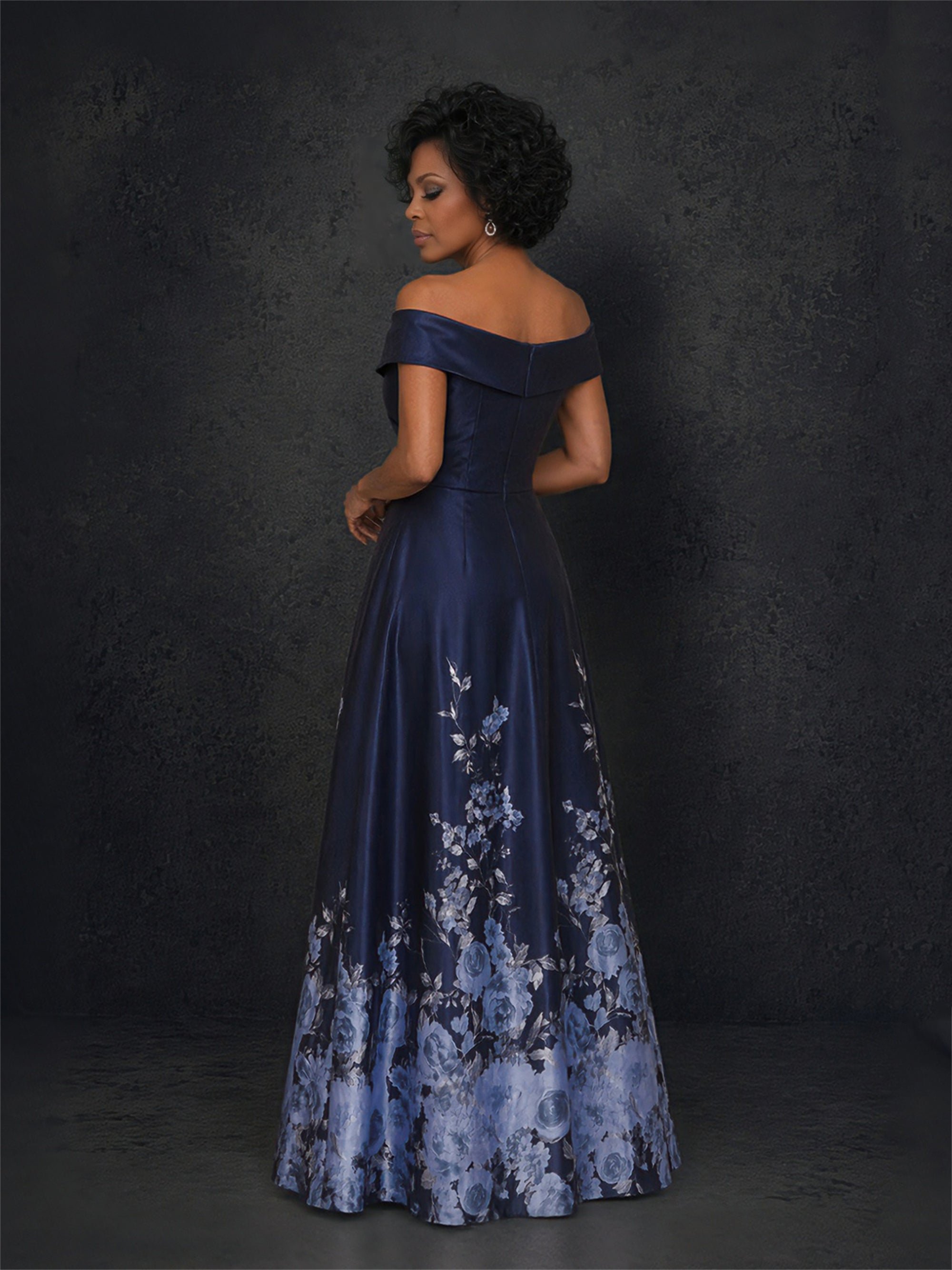 BOLODOO navy blue floral print off-shoulder satin gown - back view showing covered back and full floor-length skirt with rose print