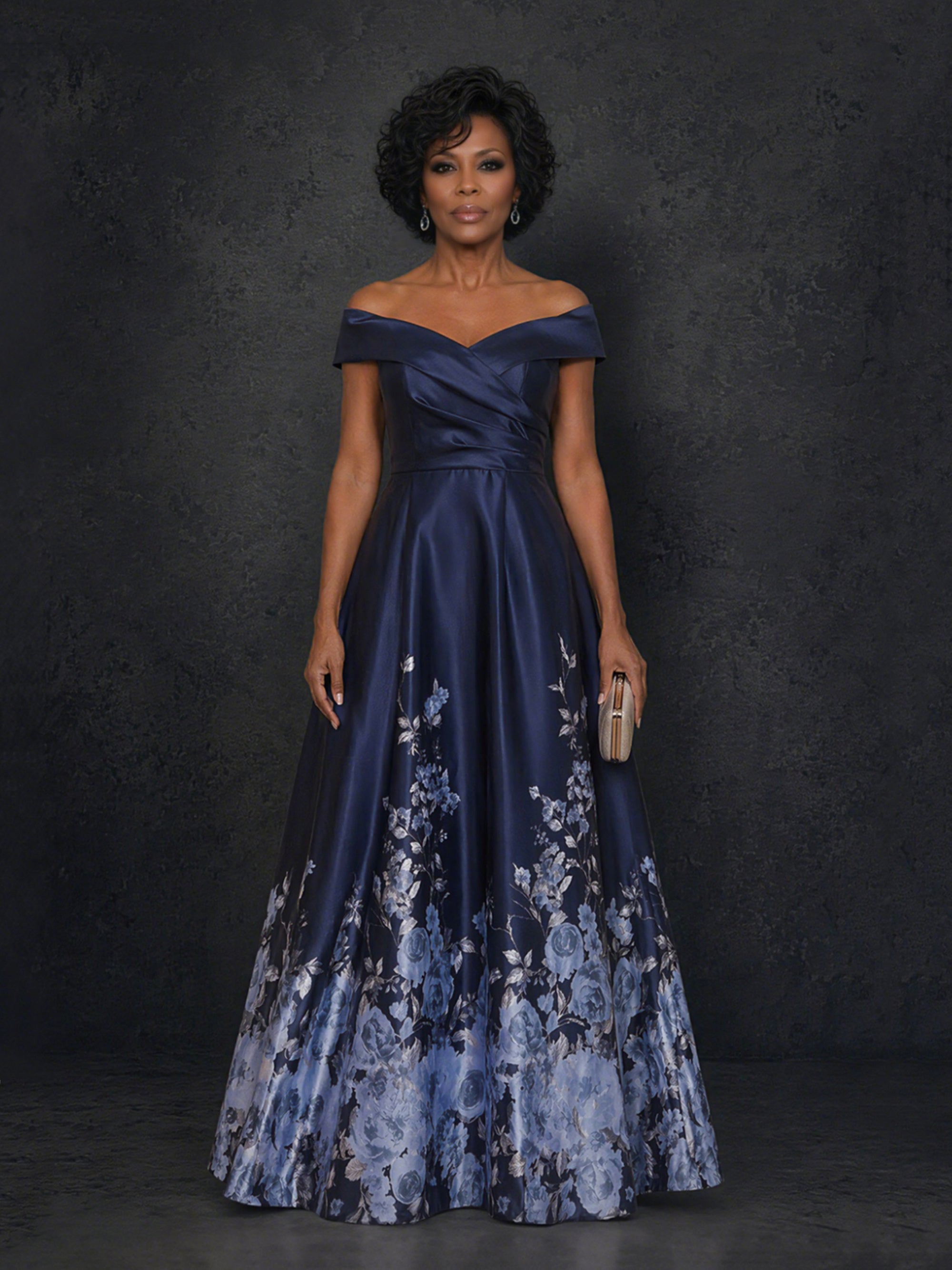 BOLODOO navy blue floral print off-shoulder satin A-line maxi gown - front full body view with clutch