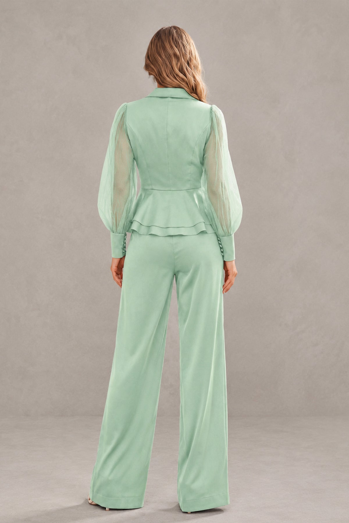 BOLODOO mint green peplum pantsuit side view showing wide-leg trousers
