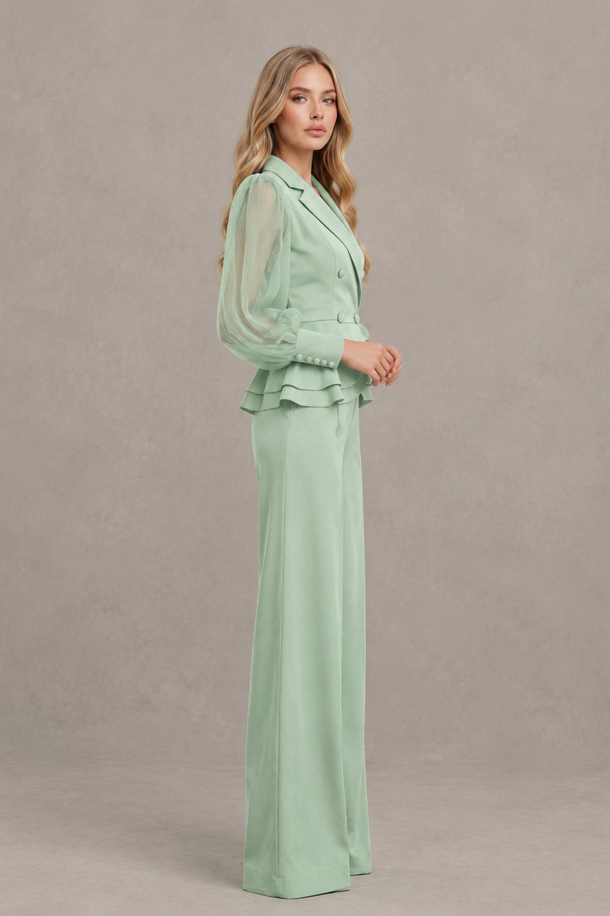 BOLODOO mint green peplum pantsuit back view showing covered back design