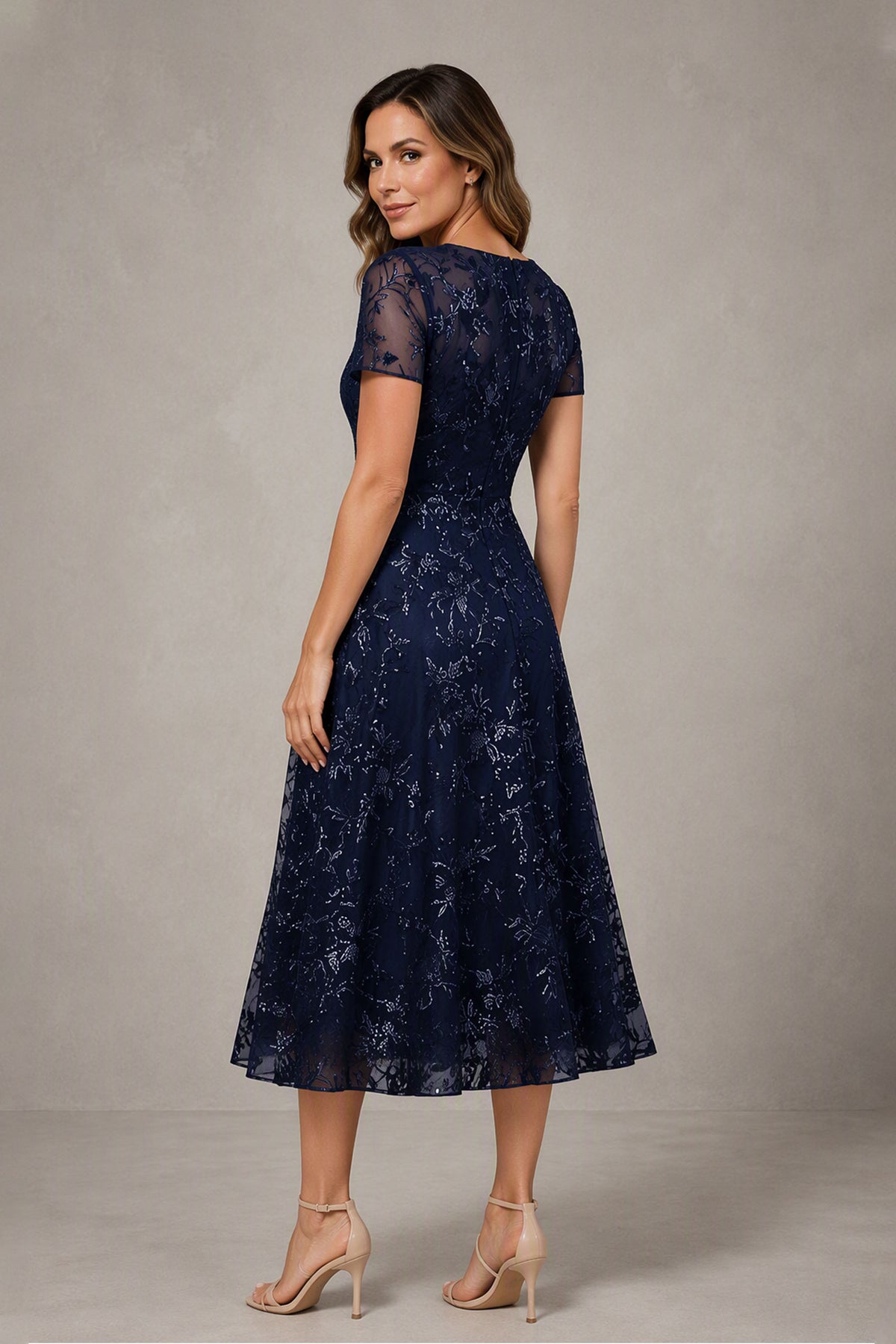 BOLODOO navy blue textured floral midi A-line dress showing round neckline, short sleeves, and textured floral finish